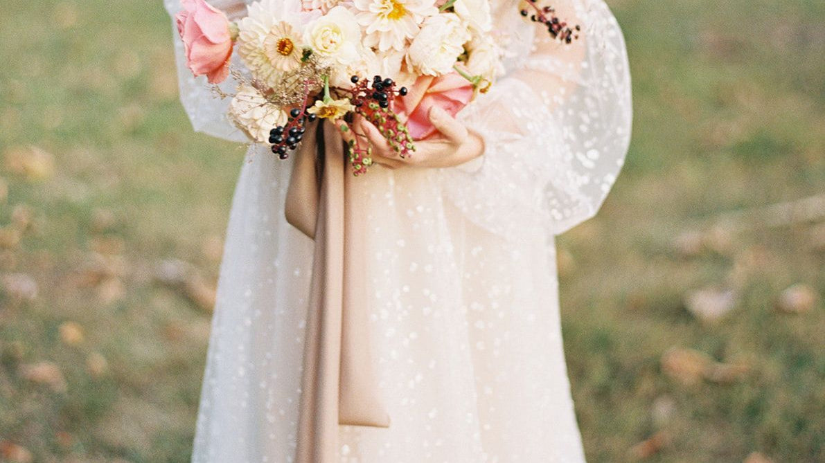 WEDDING SPARROW | A Puff Sleeved Gown with Fall Flowers