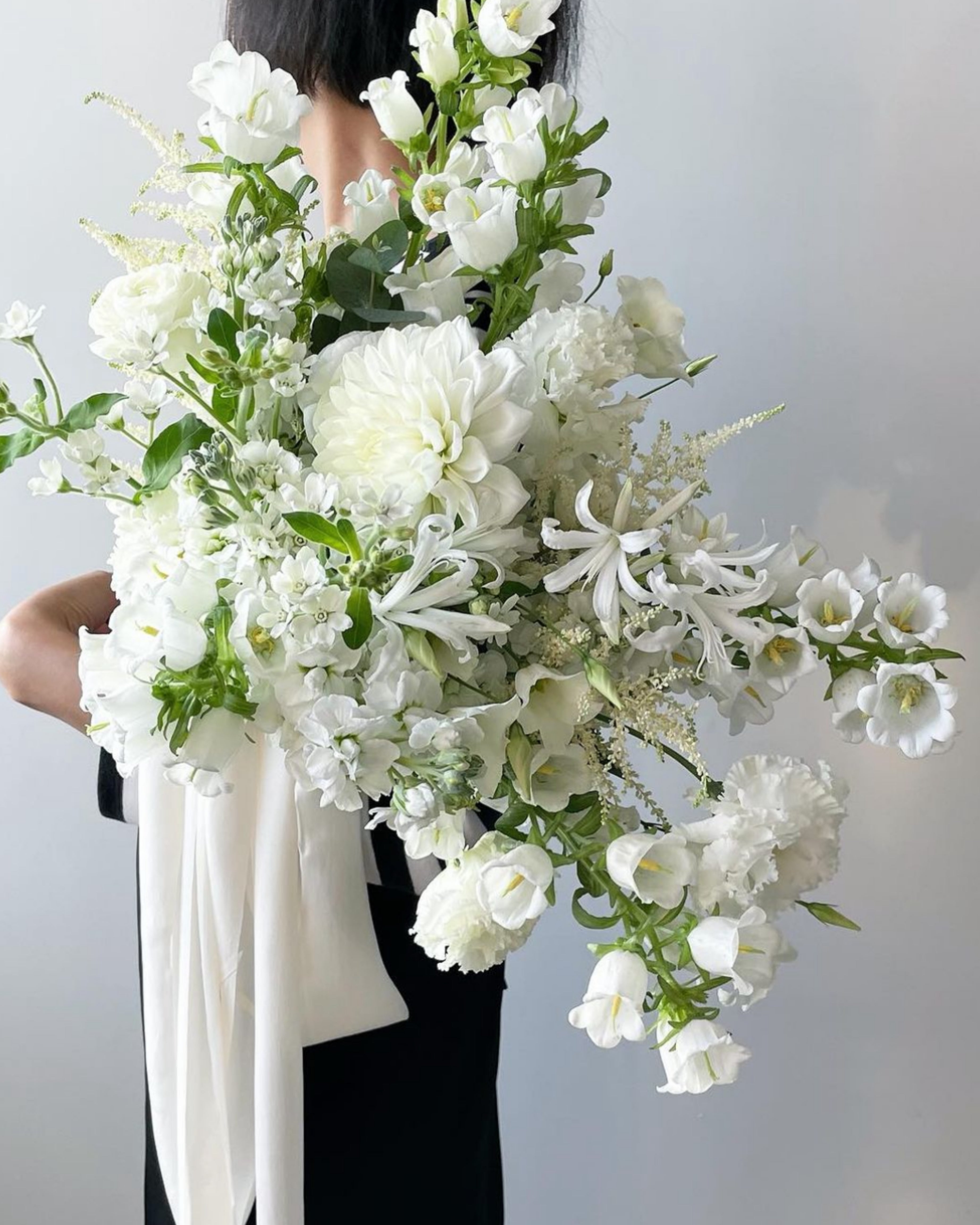 floral design by hong kong florist using antique white silk ribbons