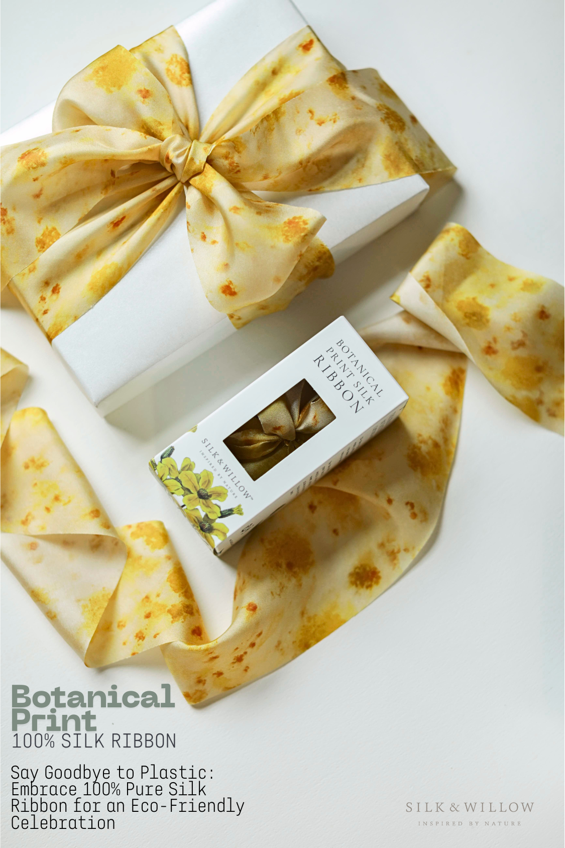 Silk ribbon with a box of botanical print ribbon next to a gift wrapped box with yellow ribbon bow on a white background