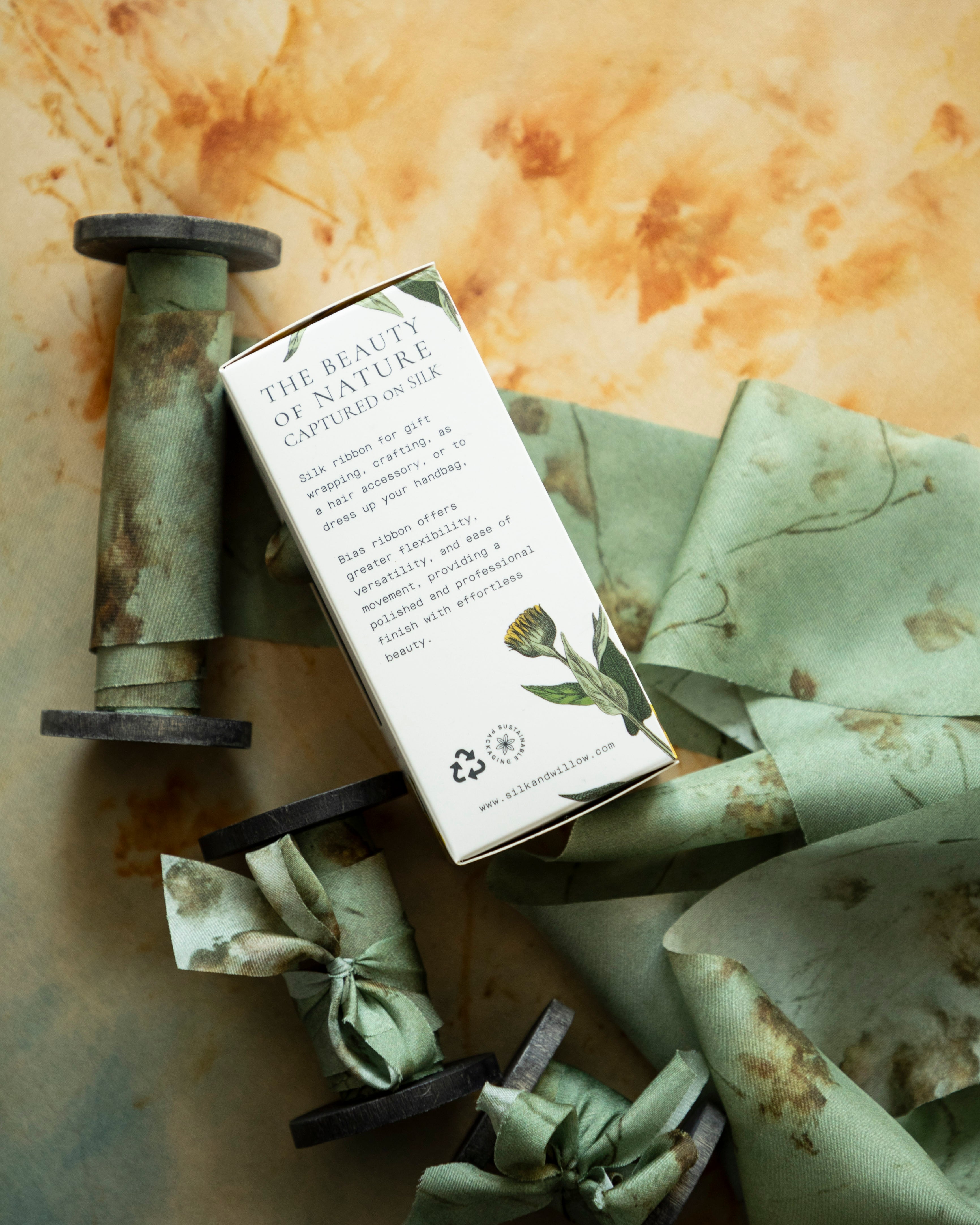 Eco-friendly silk ribbons with nature-inspired patterns, perfect for unique gift wrapping and tying market bouquets, crafted from sustainable materials