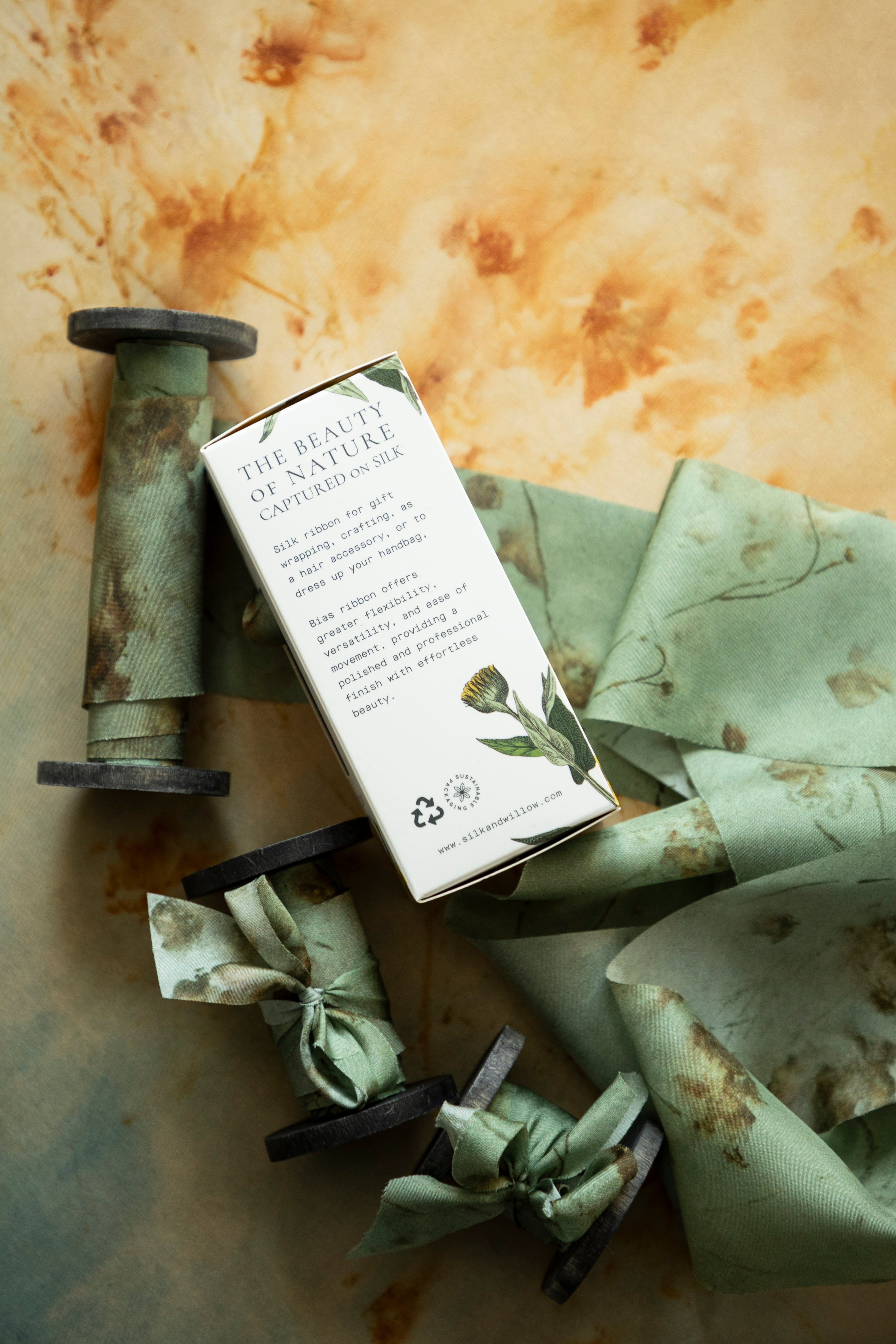 Eco-friendly silk ribbons with nature-inspired patterns, perfect for unique gift wrapping and tying market bouquets, crafted from sustainable materials