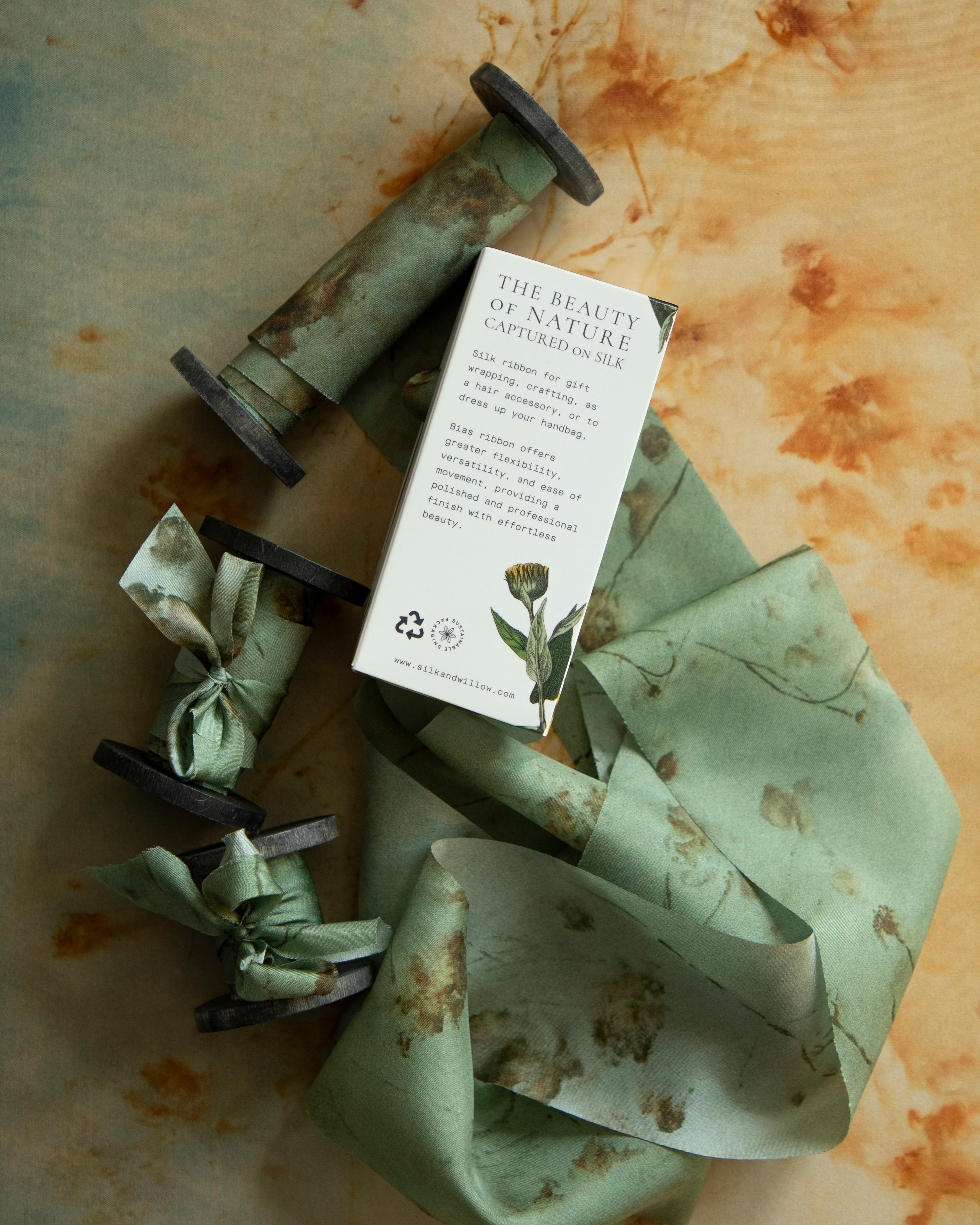 Eco-friendly silk ribbons with nature-inspired patterns, perfect for unique gift wrapping and tying market bouquets, crafted from sustainable materials