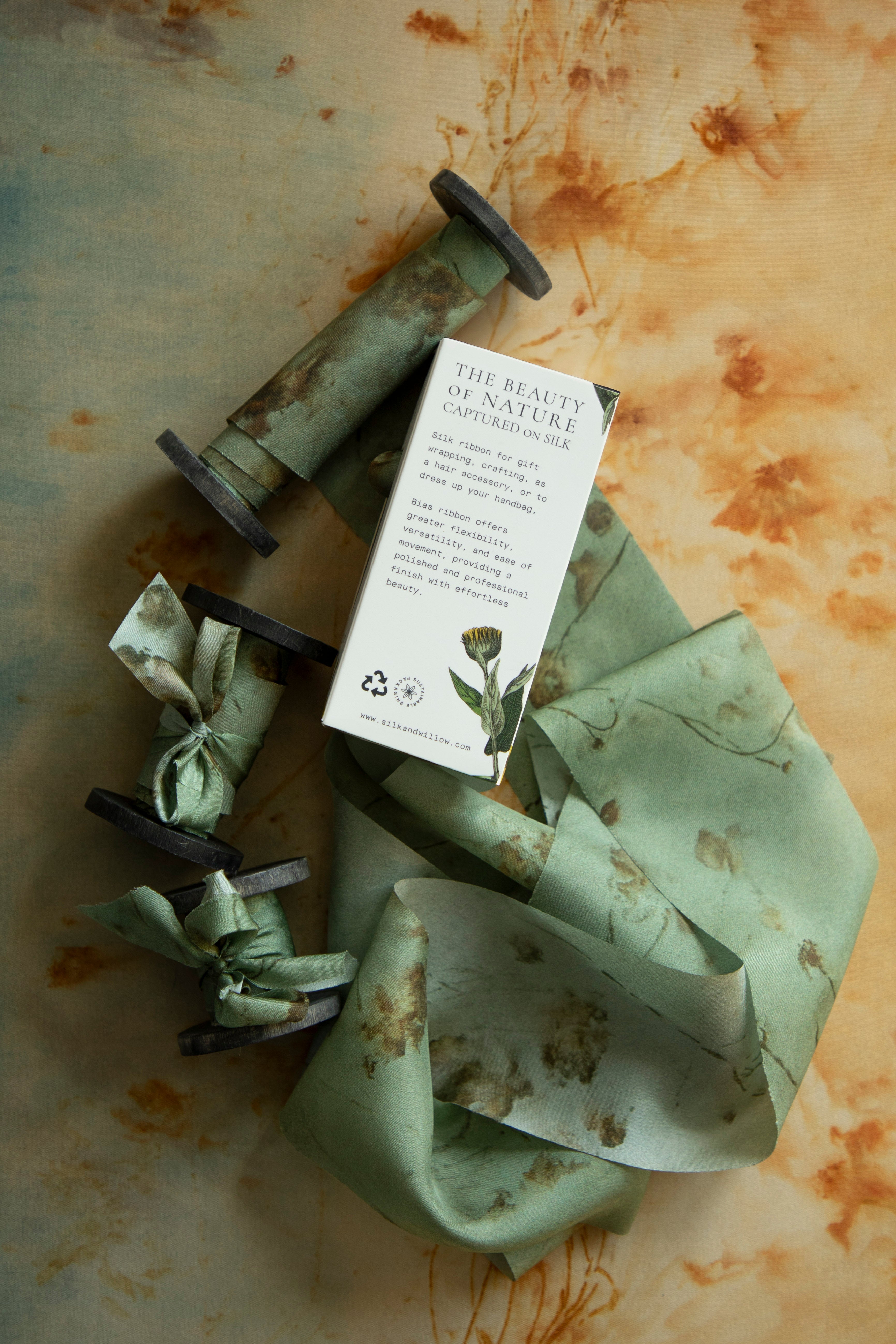 Eco-friendly silk ribbons with nature-inspired patterns, perfect for unique gift wrapping and tying market bouquets, crafted from sustainable materials