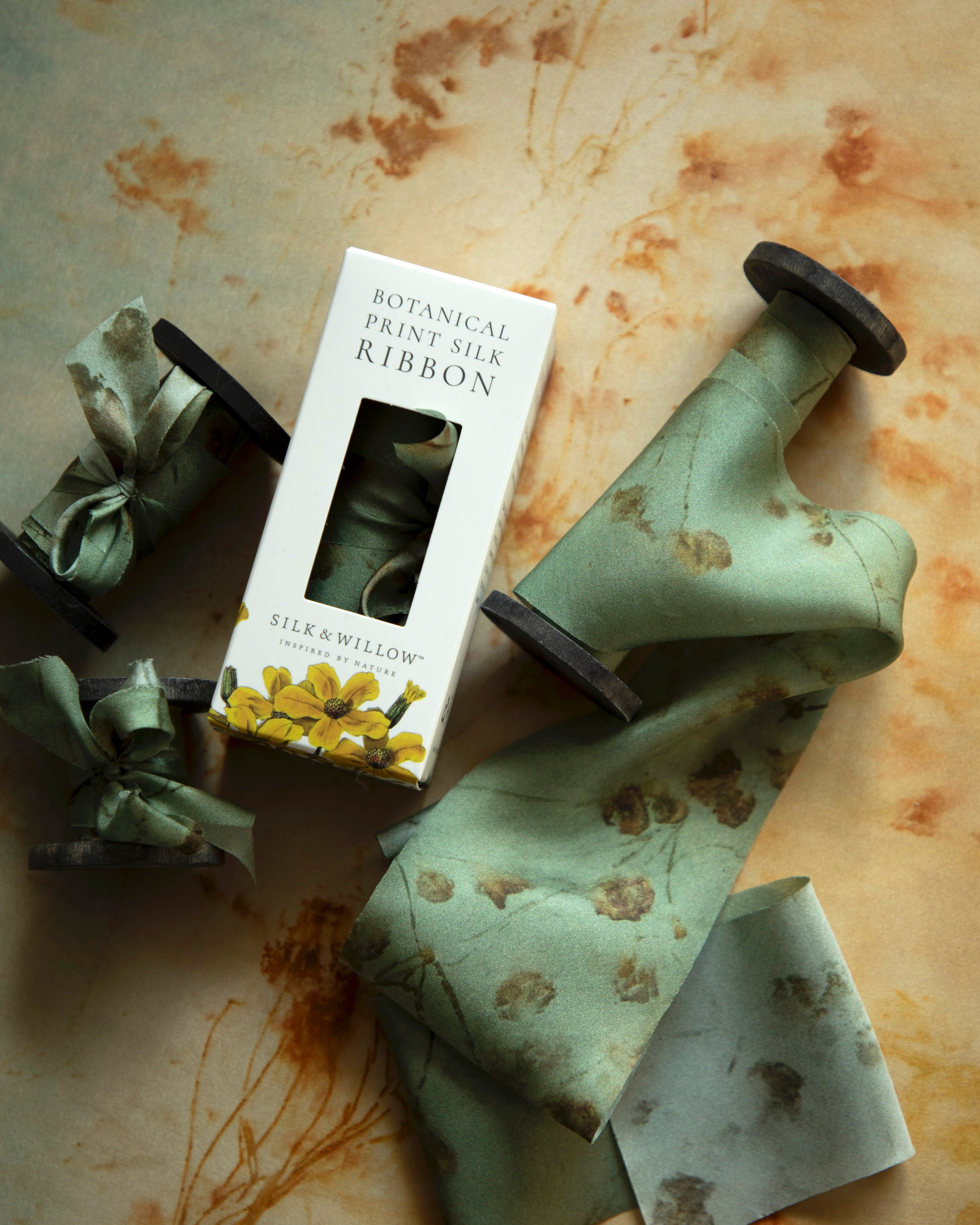 Eco-friendly silk ribbons with nature-inspired patterns, perfect for unique gift wrapping and tying market bouquets, crafted from sustainable materials