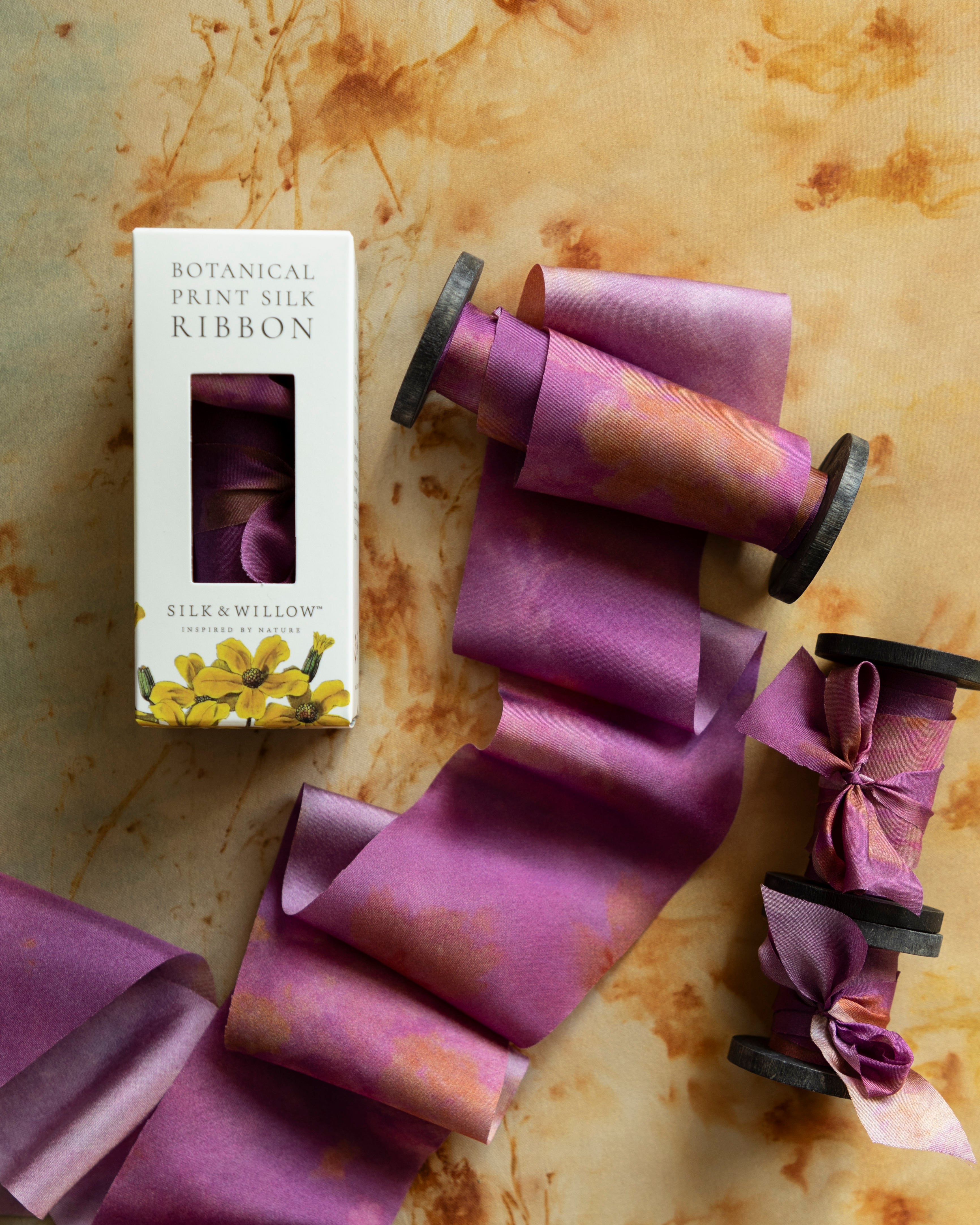 Eco-friendly silk ribbons with nature-inspired patterns, perfect for unique gift wrapping and tying market bouquets, crafted from sustainable materials