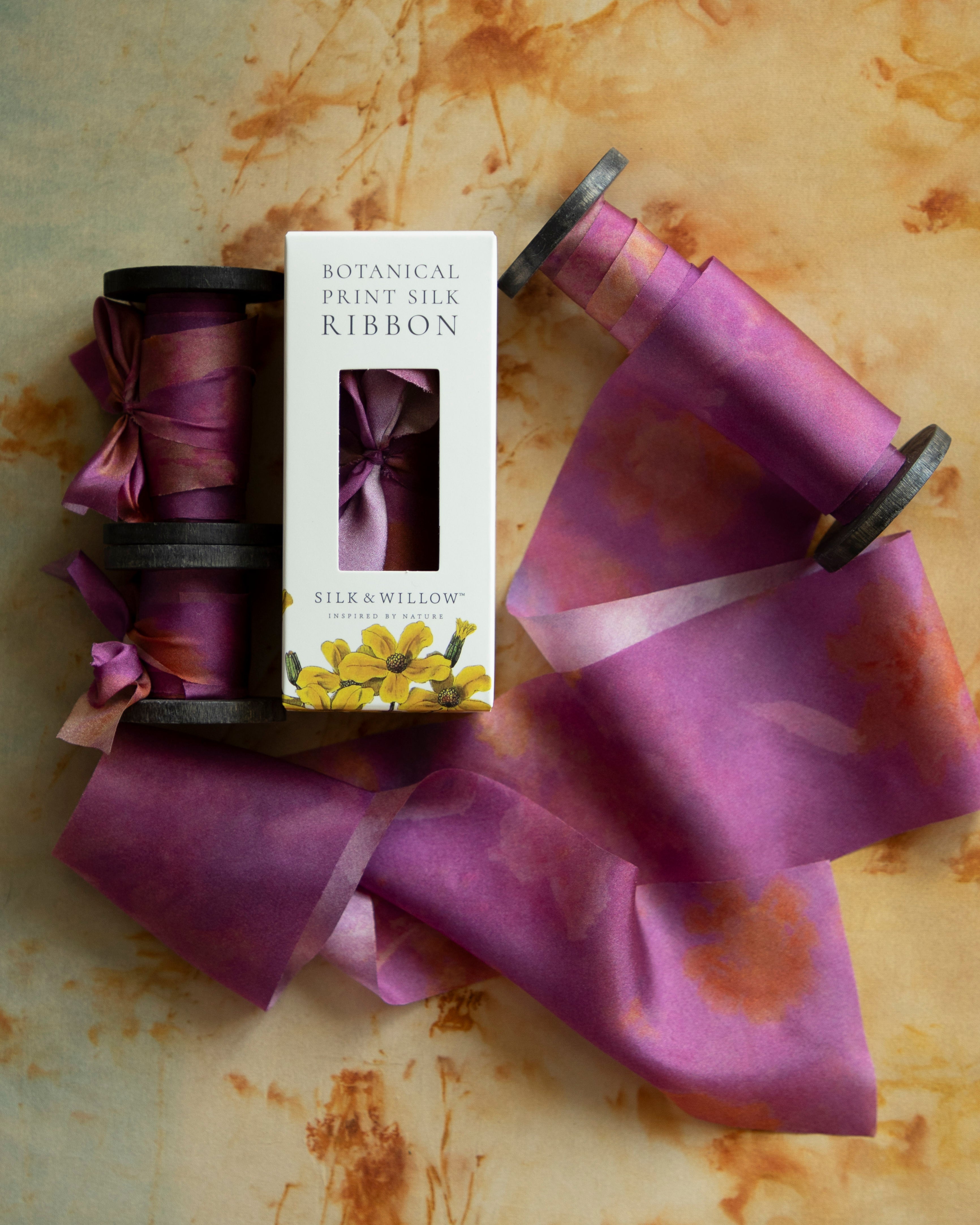Eco-friendly silk ribbons with nature-inspired patterns, perfect for unique gift wrapping and tying market bouquets, crafted from sustainable materials