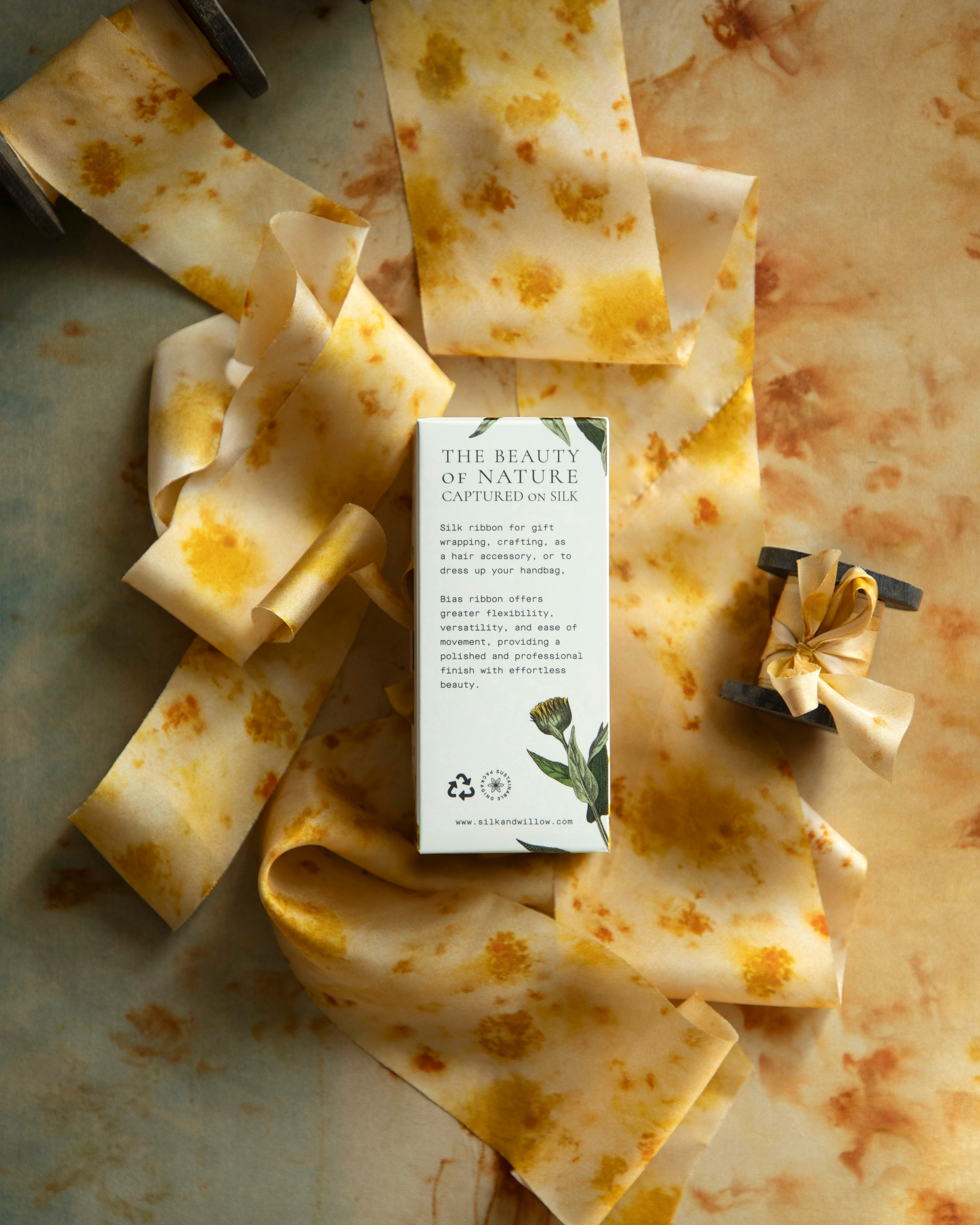 Eco-friendly silk ribbons with nature-inspired patterns, perfect for unique gift wrapping and tying market bouquets, crafted from sustainable materials.
