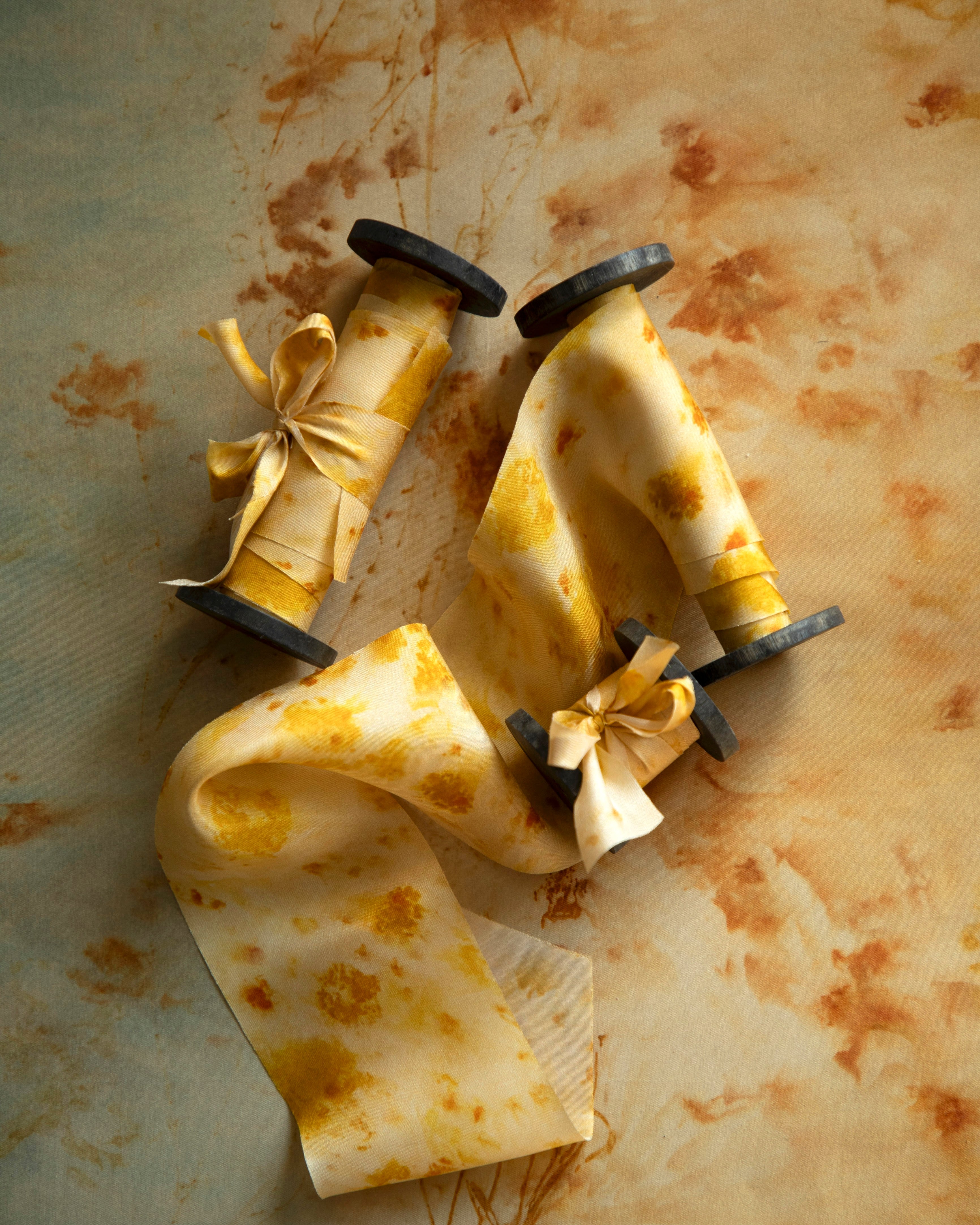 Eco-friendly silk ribbons with nature-inspired patterns, perfect for unique gift wrapping and tying market bouquets, crafted from sustainable materials