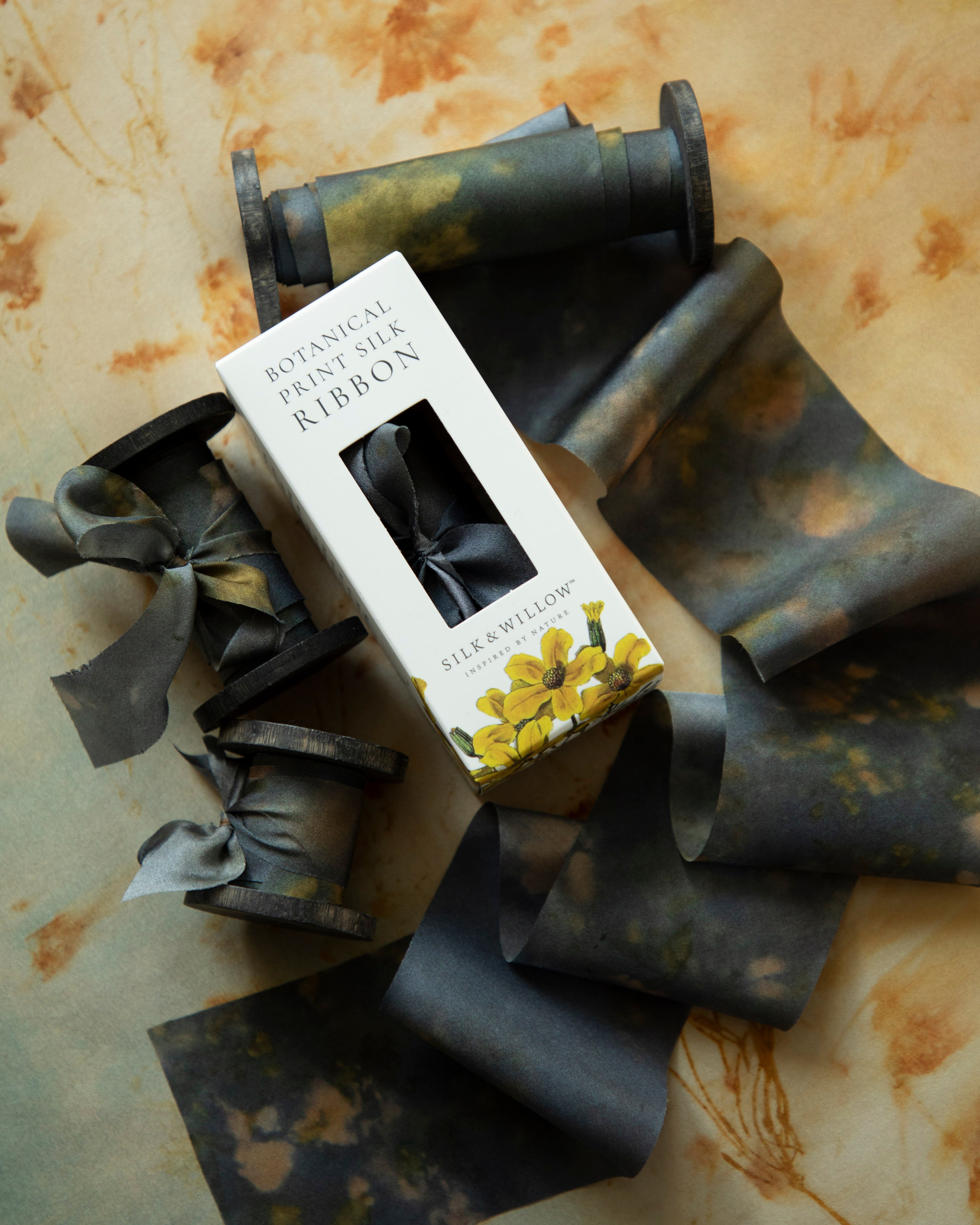 Eco-friendly silk ribbons with nature-inspired patterns, perfect for unique gift wrapping and tying market bouquets, crafted from sustainable materials