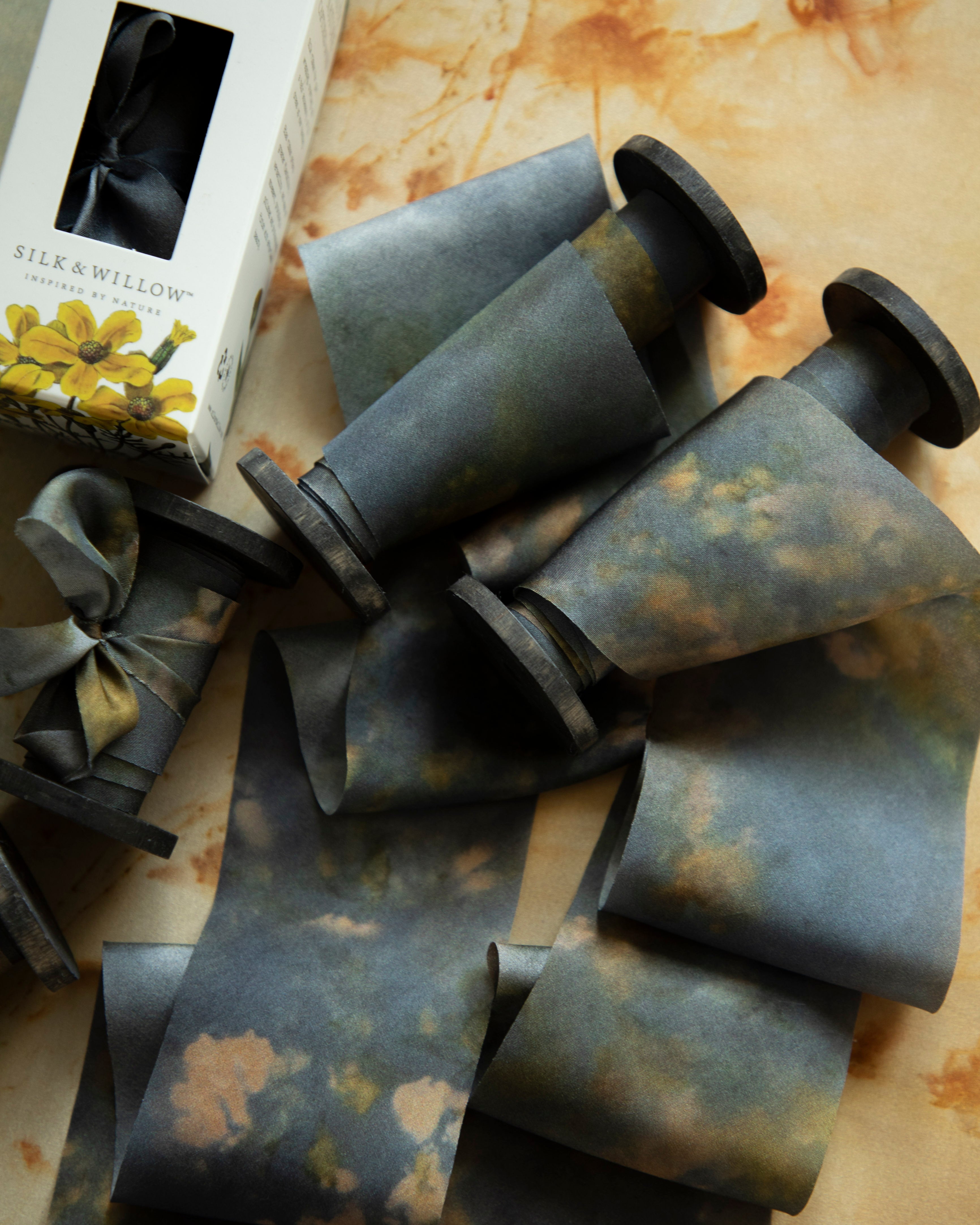 Eco-friendly silk ribbons with nature-inspired patterns, perfect for unique gift wrapping and tying market bouquets, crafted from sustainable materials