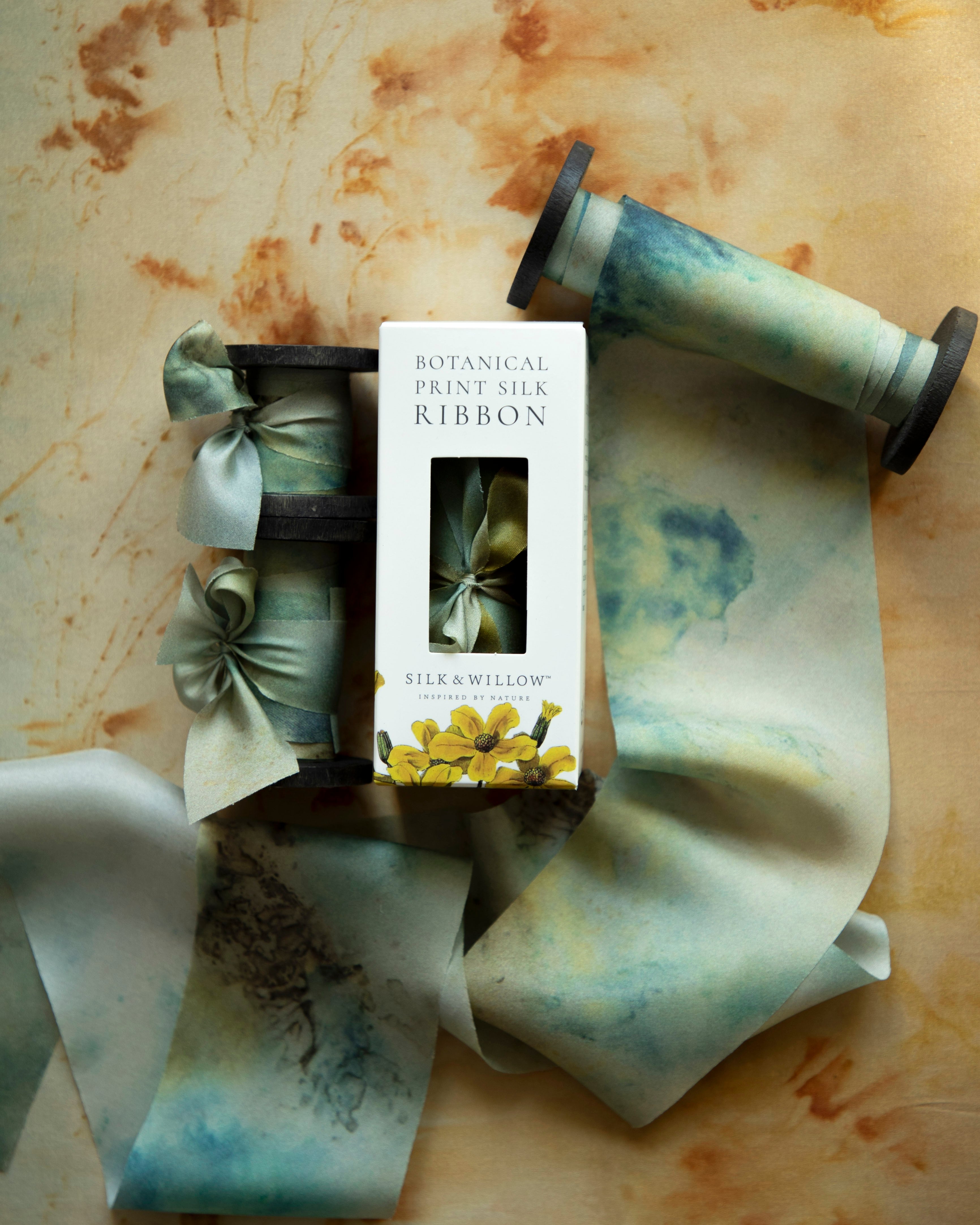 Eco-friendly silk ribbons with nature-inspired patterns, perfect for unique gift wrapping and tying market bouquets, crafted from sustainable materials