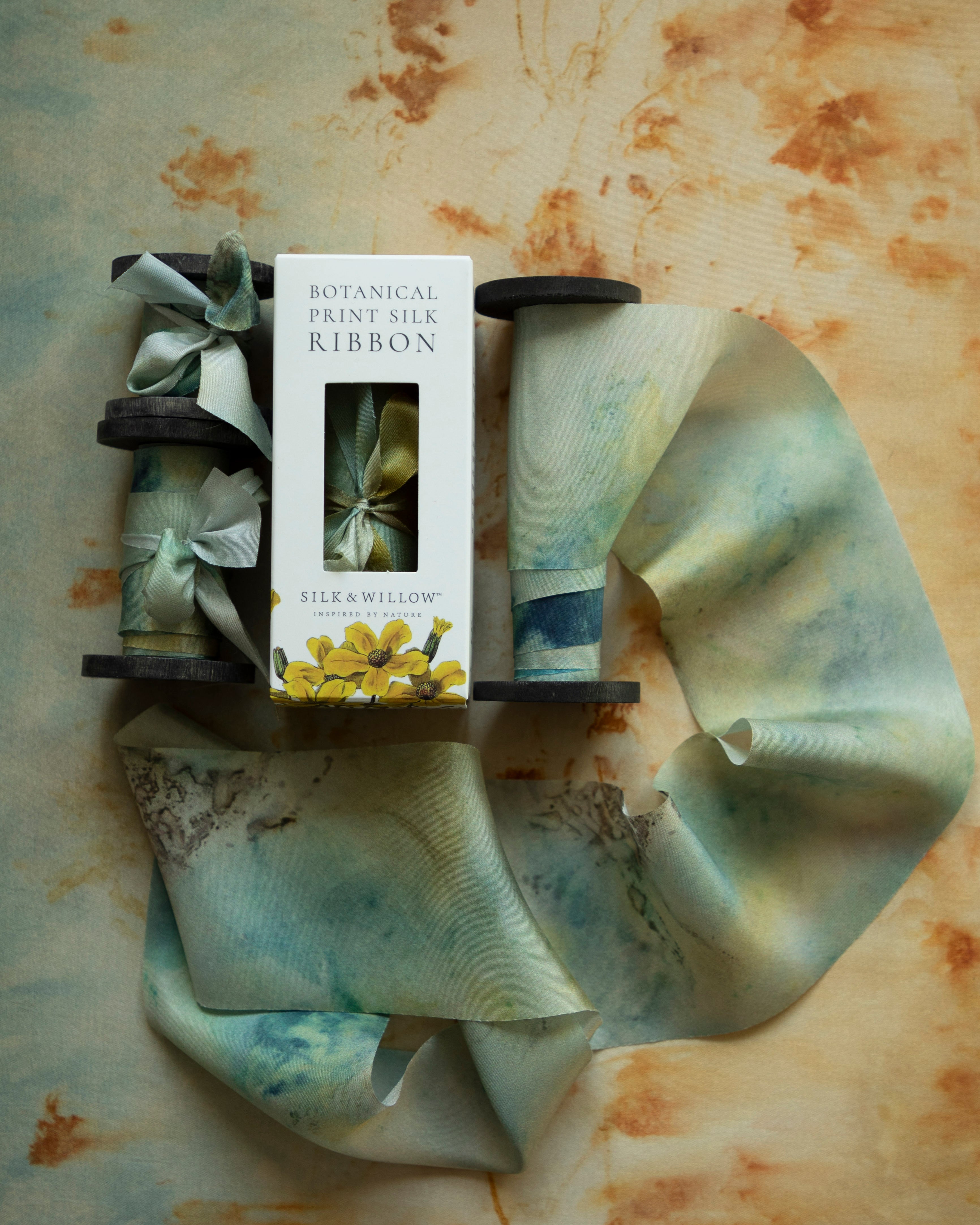 Eco-friendly silk ribbons with nature-inspired patterns, perfect for unique gift wrapping and tying market bouquets, crafted from sustainable materials