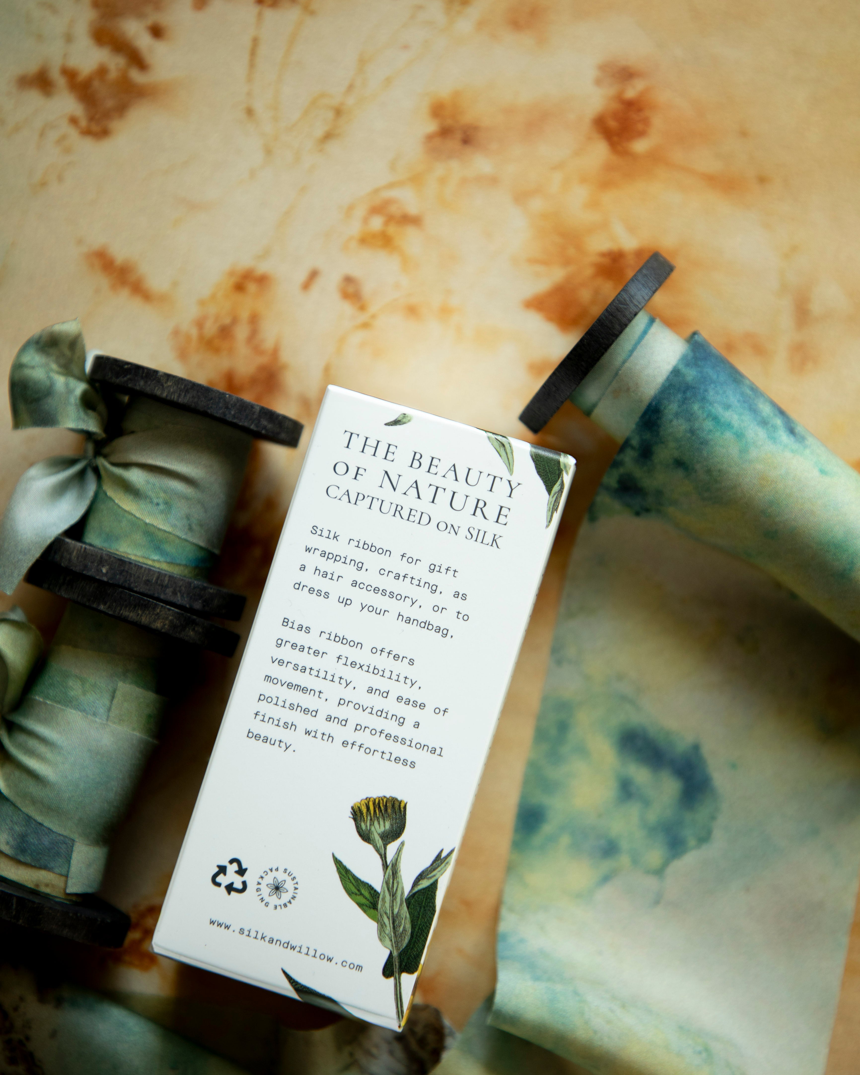 Eco-friendly silk ribbons with nature-inspired patterns, perfect for unique gift wrapping and tying market bouquets, crafted from sustainable materials