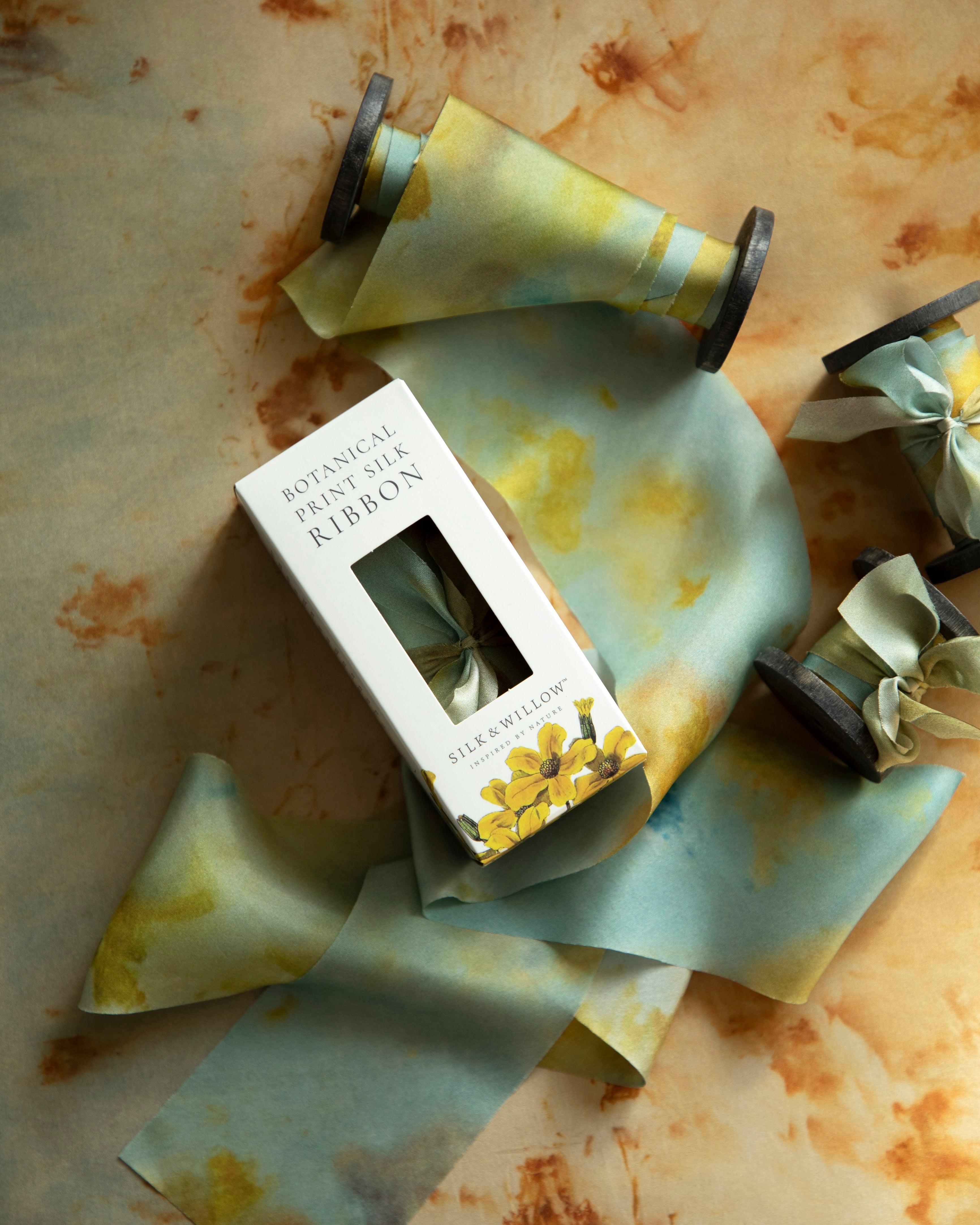 Eco-friendly silk ribbons with nature-inspired patterns, perfect for unique gift wrapping and tying market bouquets, crafted from sustainable materials