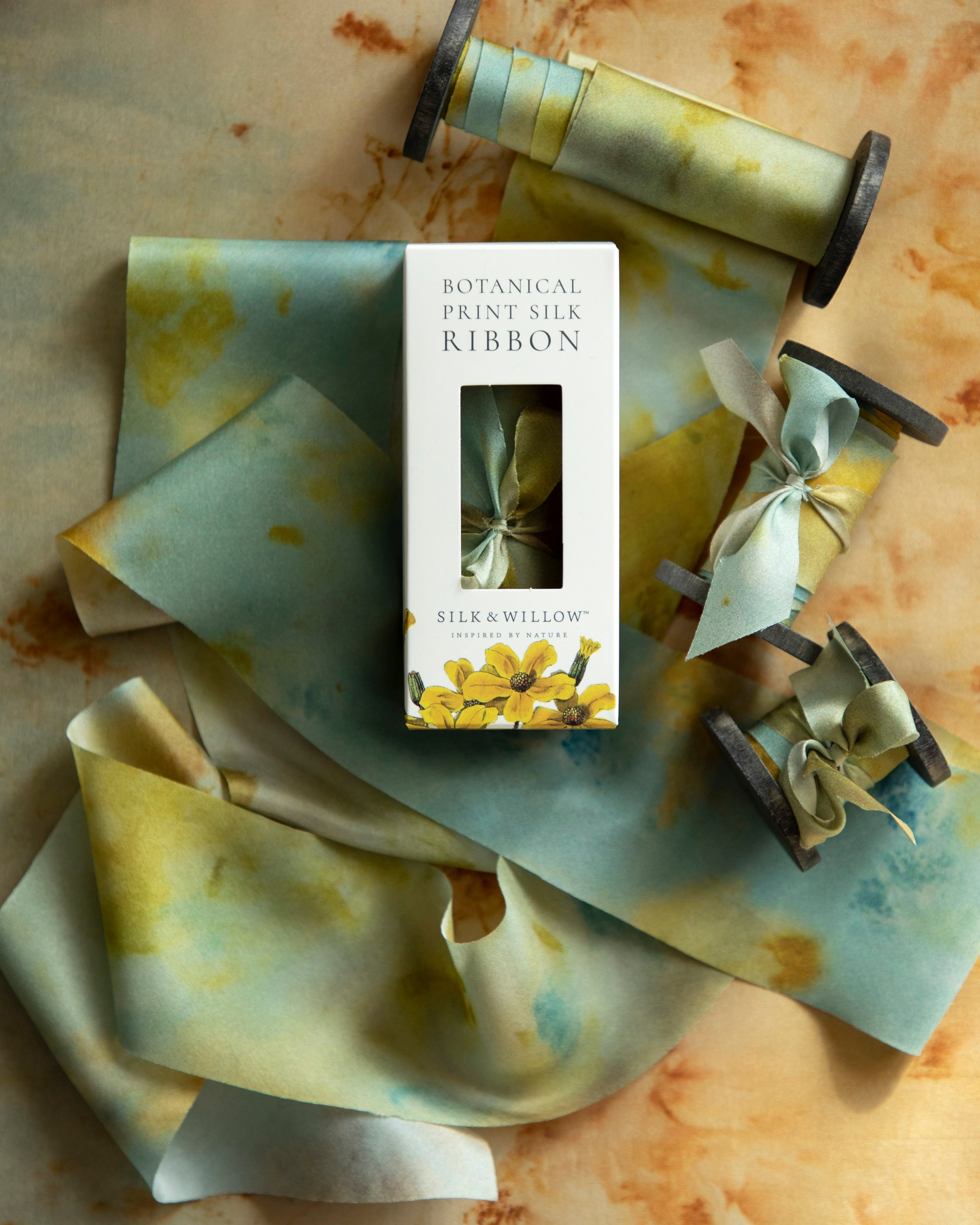 Eco-friendly silk ribbons with nature-inspired patterns, perfect for unique gift wrapping and tying market bouquets, crafted from sustainable materials