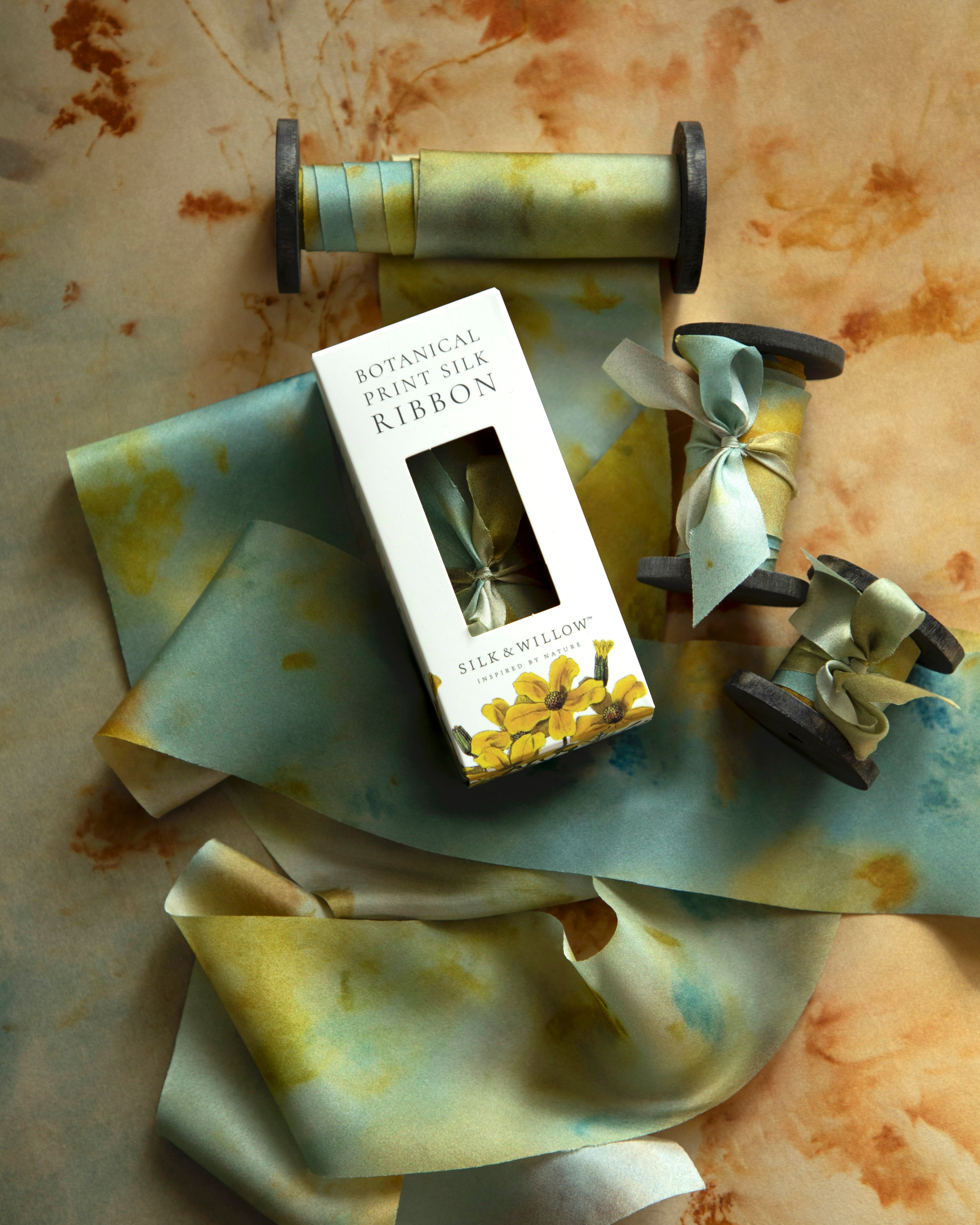 Eco-friendly silk ribbons with nature-inspired patterns, perfect for unique gift wrapping and tying market bouquets, crafted from sustainable materials