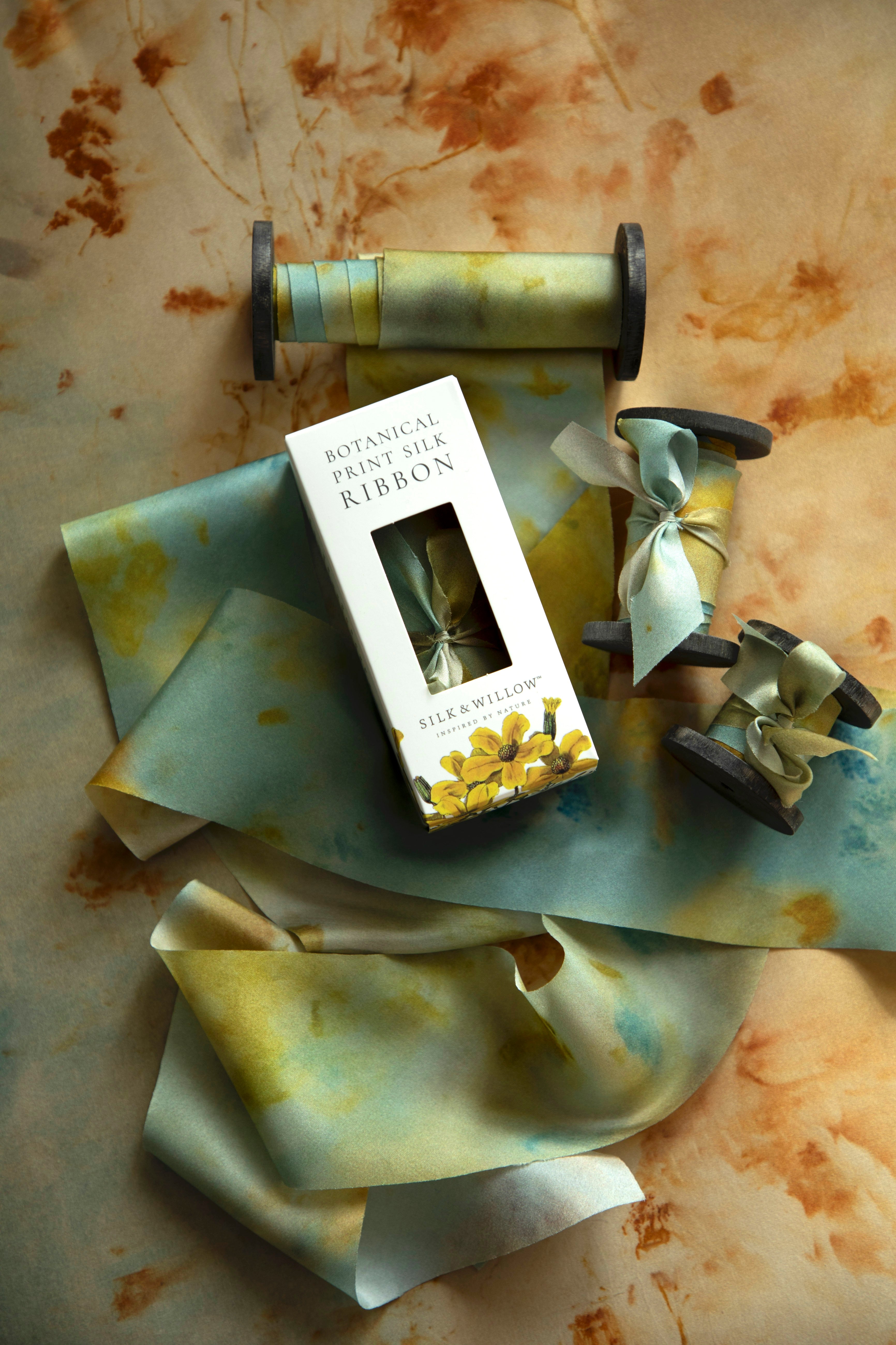 Eco-friendly silk ribbons with nature-inspired patterns, perfect for unique gift wrapping and tying market bouquets, crafted from sustainable materials