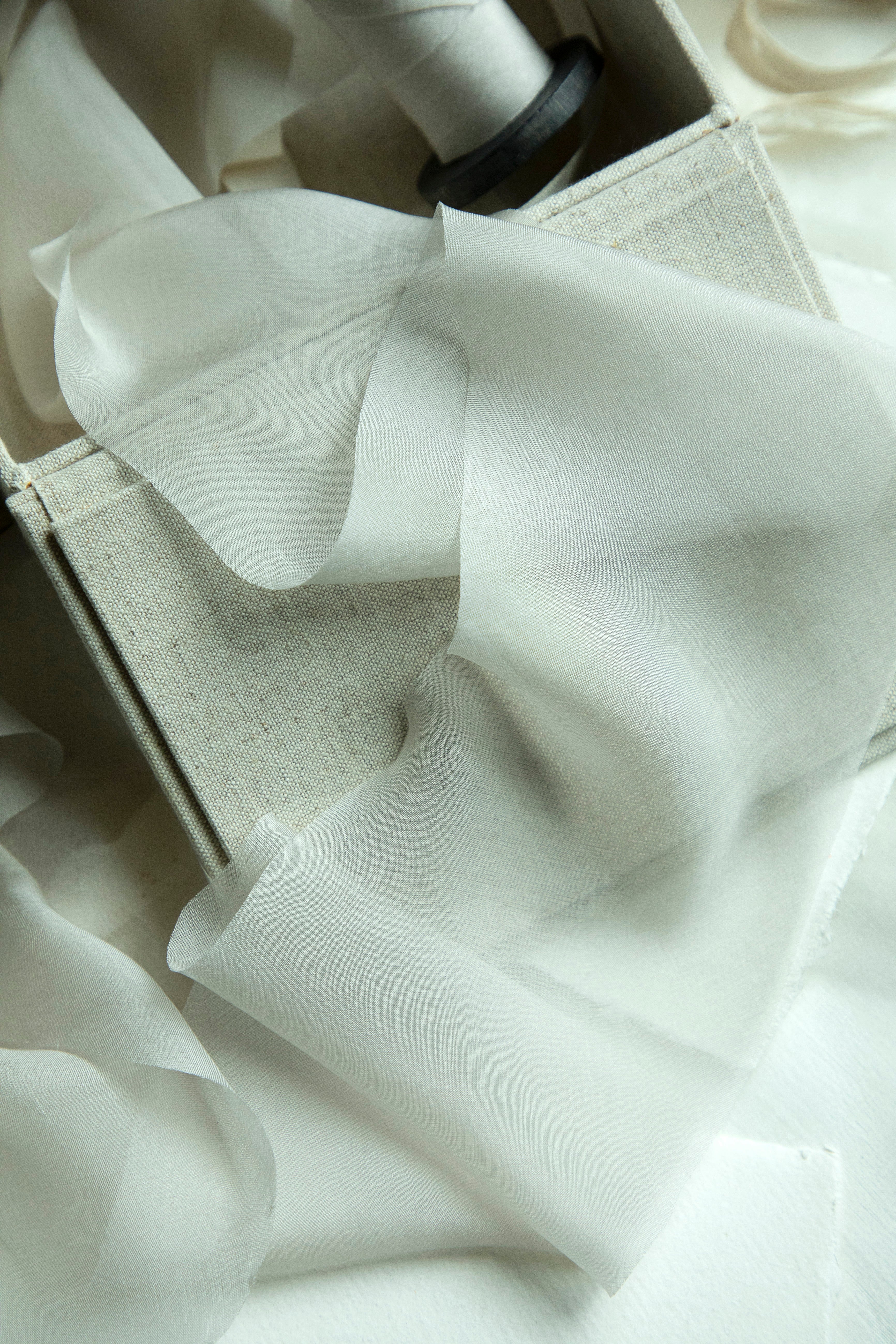 Close-up of white fabric with a textured surface