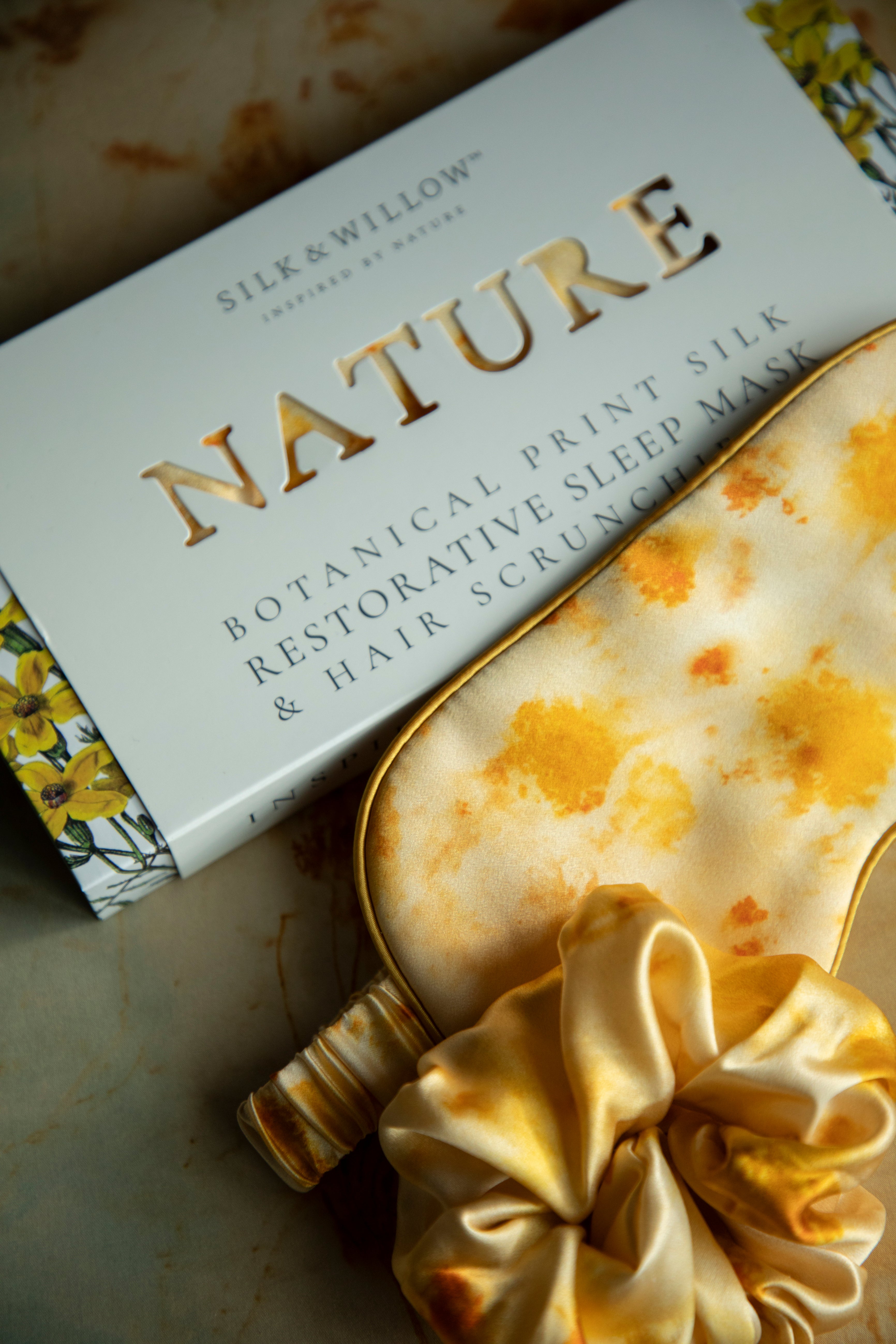 luxury silk sleep eye mask. yellow marigold flower prints.