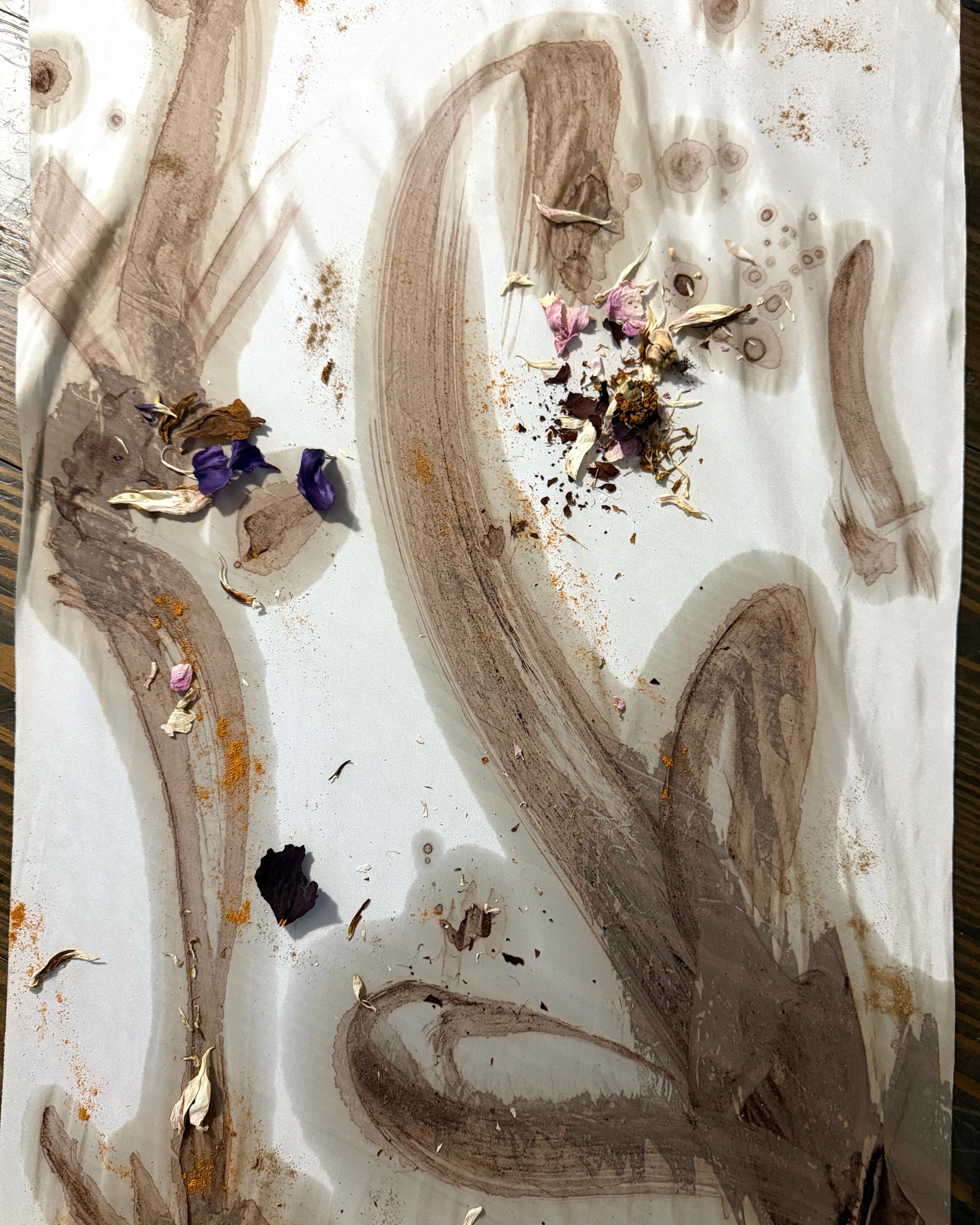 Abstract art with brown and beige brush strokes on a white background