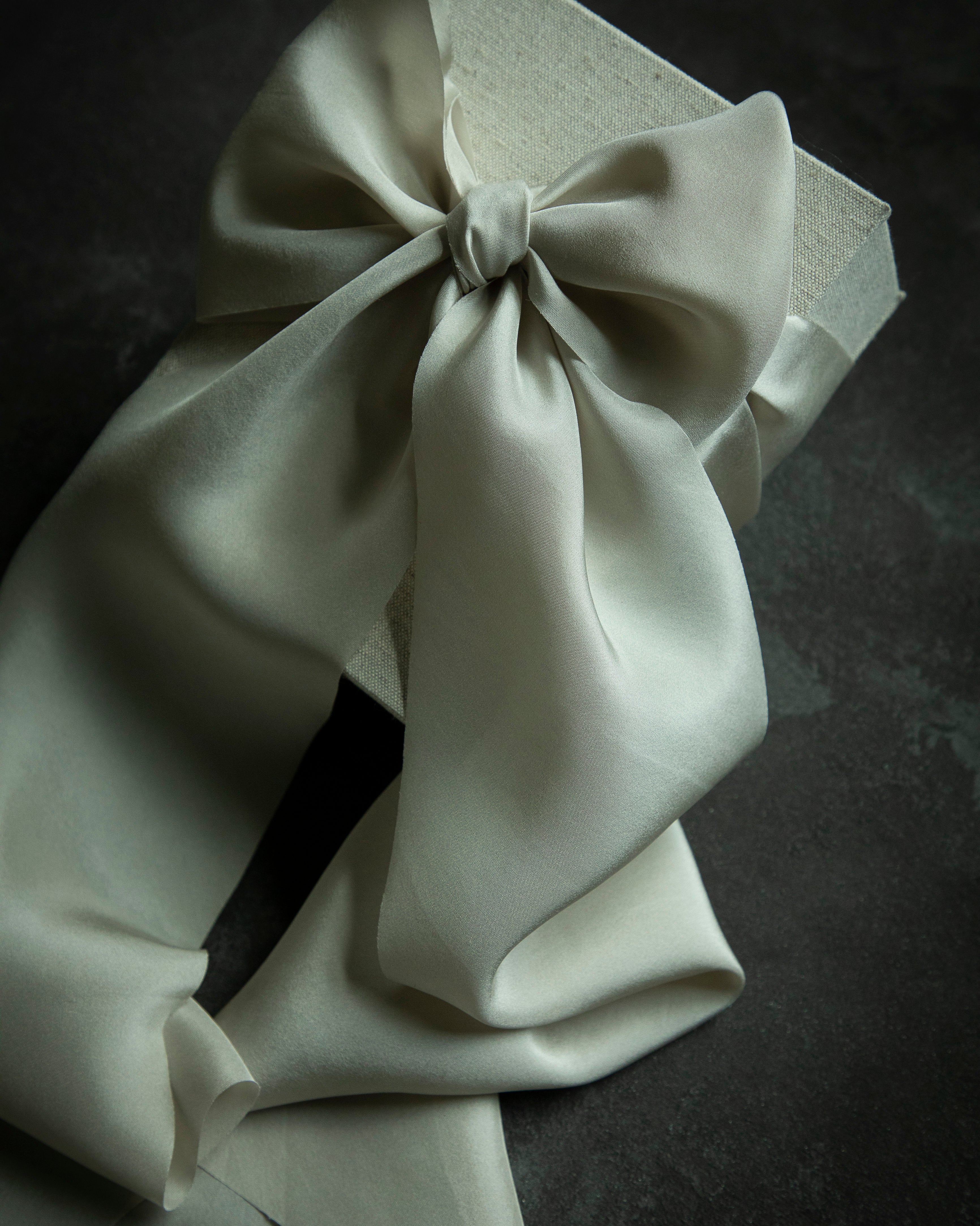 White bow on a dark background