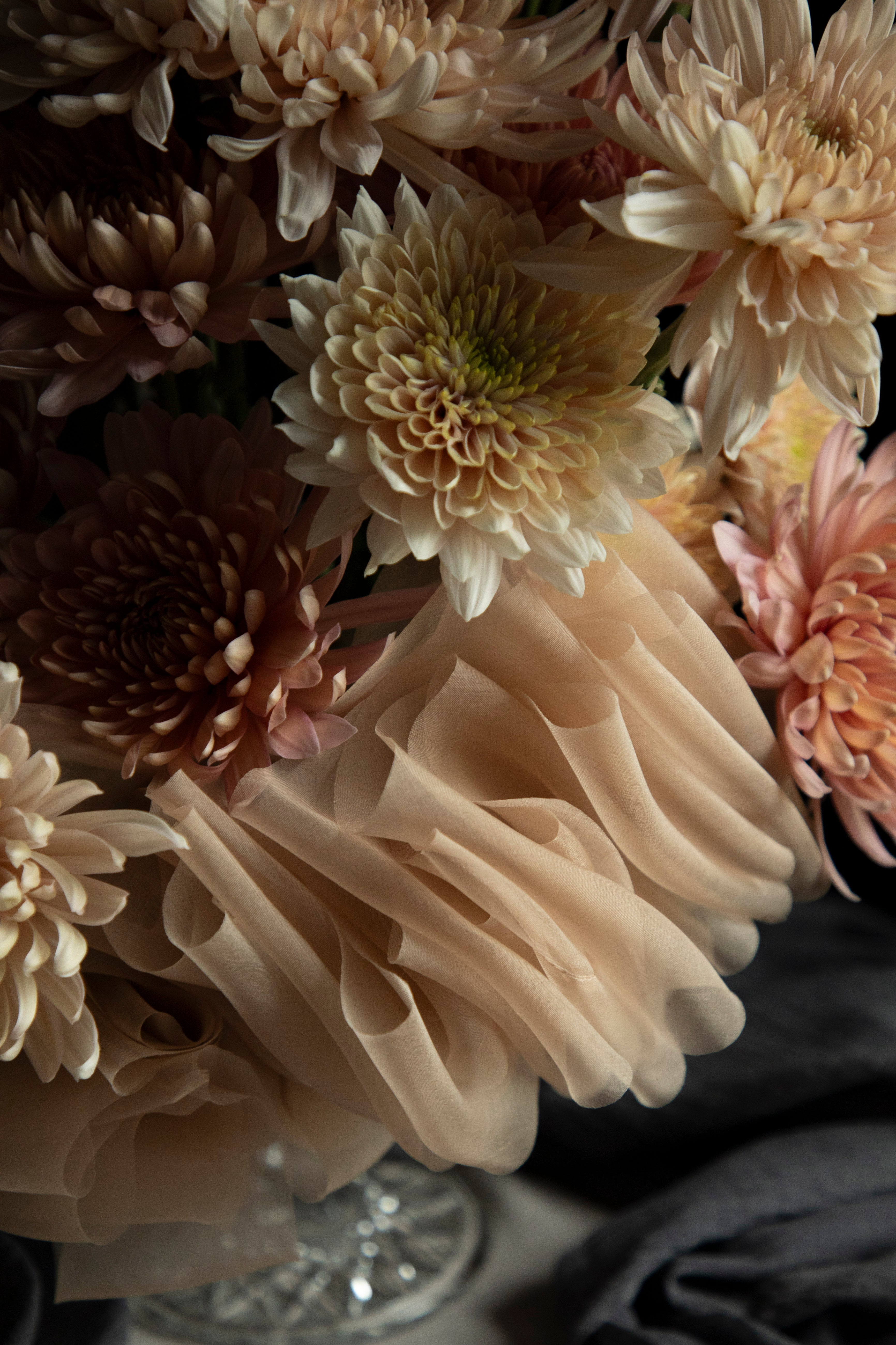 Close-up of a bouquet of flowers with a neutral color palette.