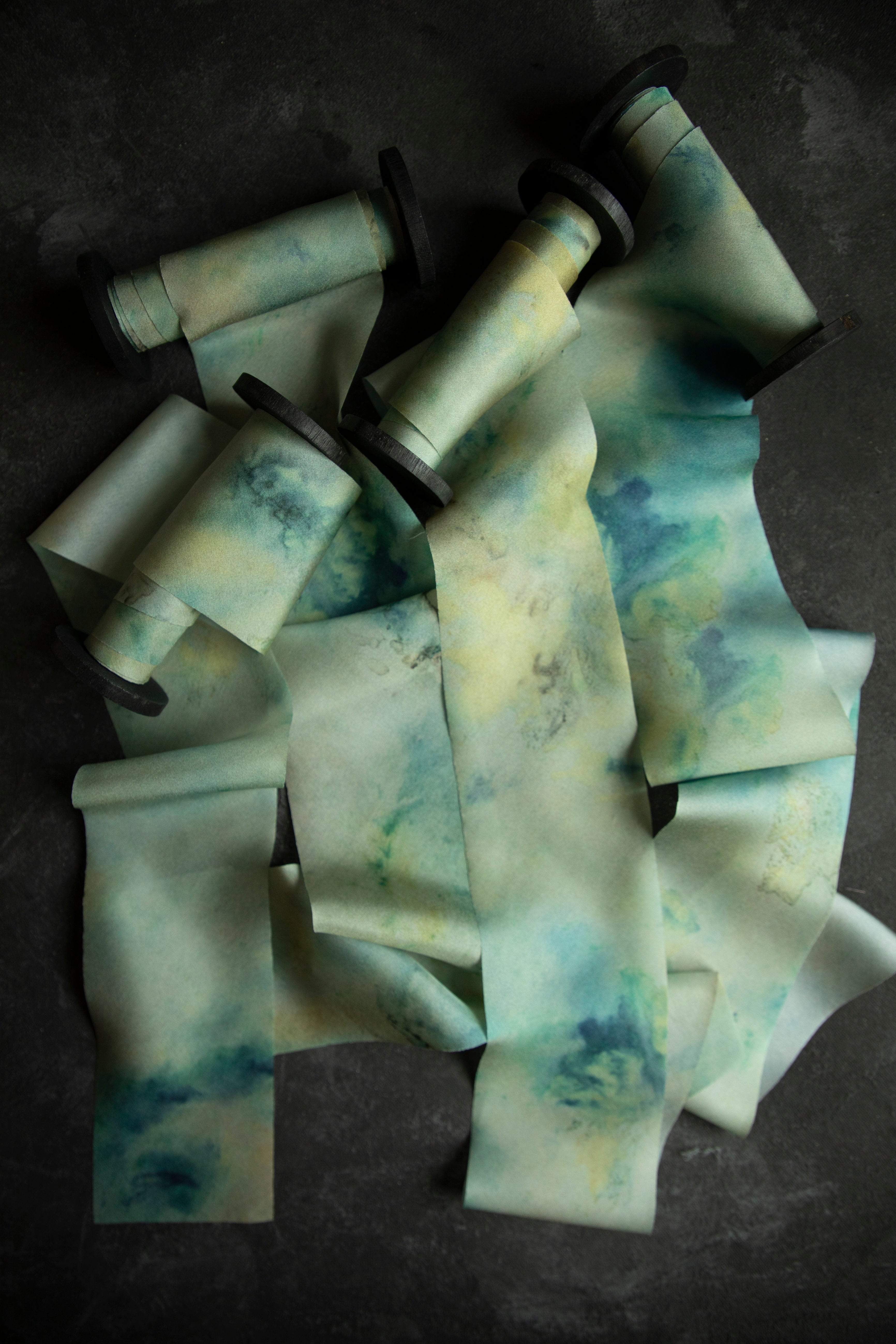 Eco-friendly silk ribbons with nature-inspired patterns, perfect for unique gift wrapping and tying market bouquets, crafted from sustainable materials