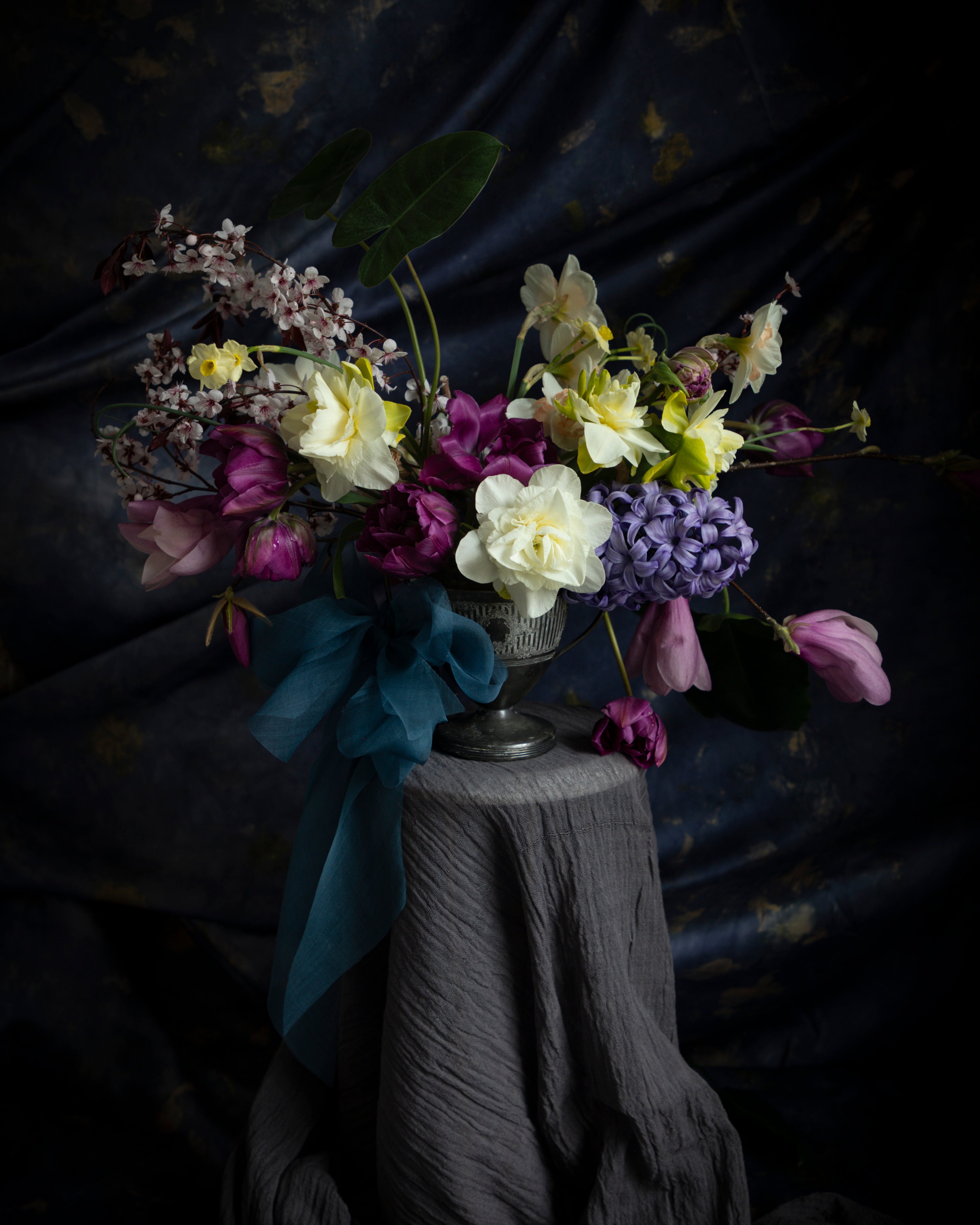 tulip flower arrangement dark moody background