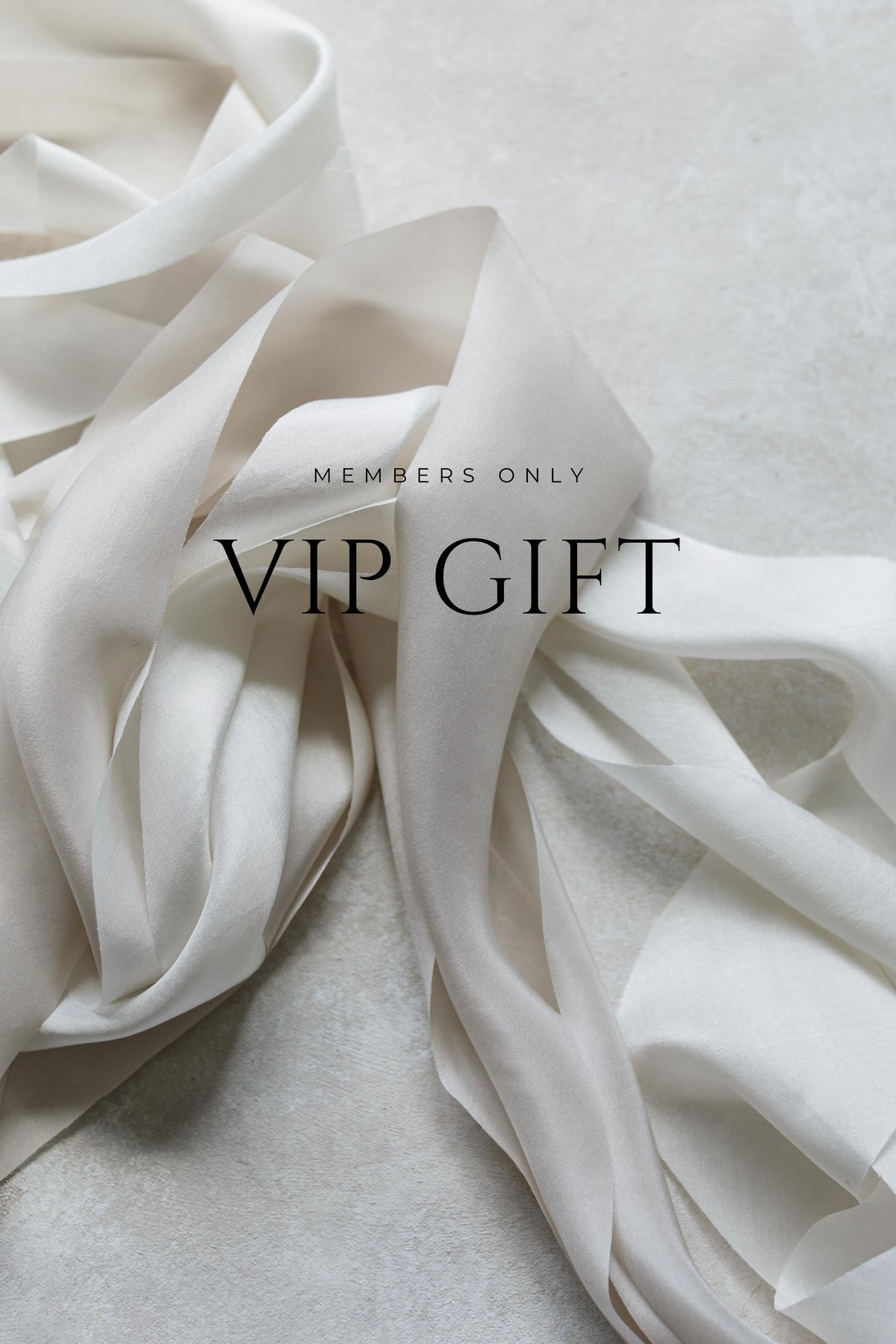 A draped piece of fabric with 'MEMBERS ONLY VIP GIFT' text overlayed on top.