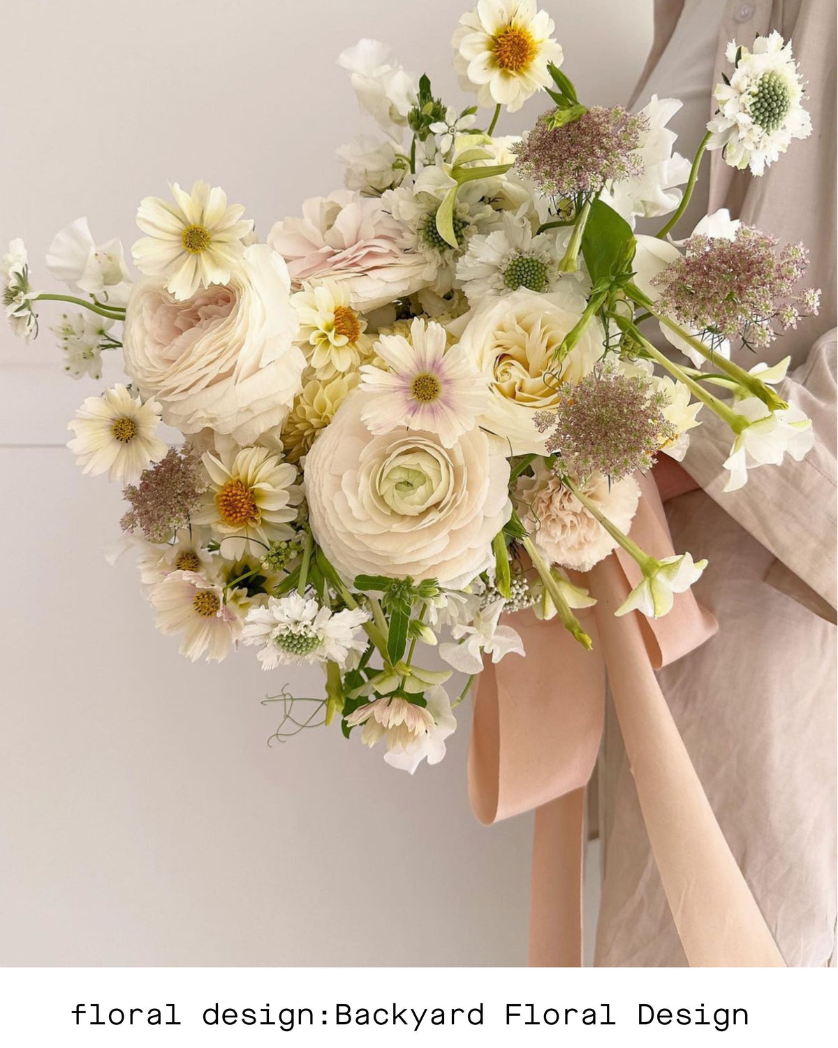 wedding bouquet with blush ribbon bow