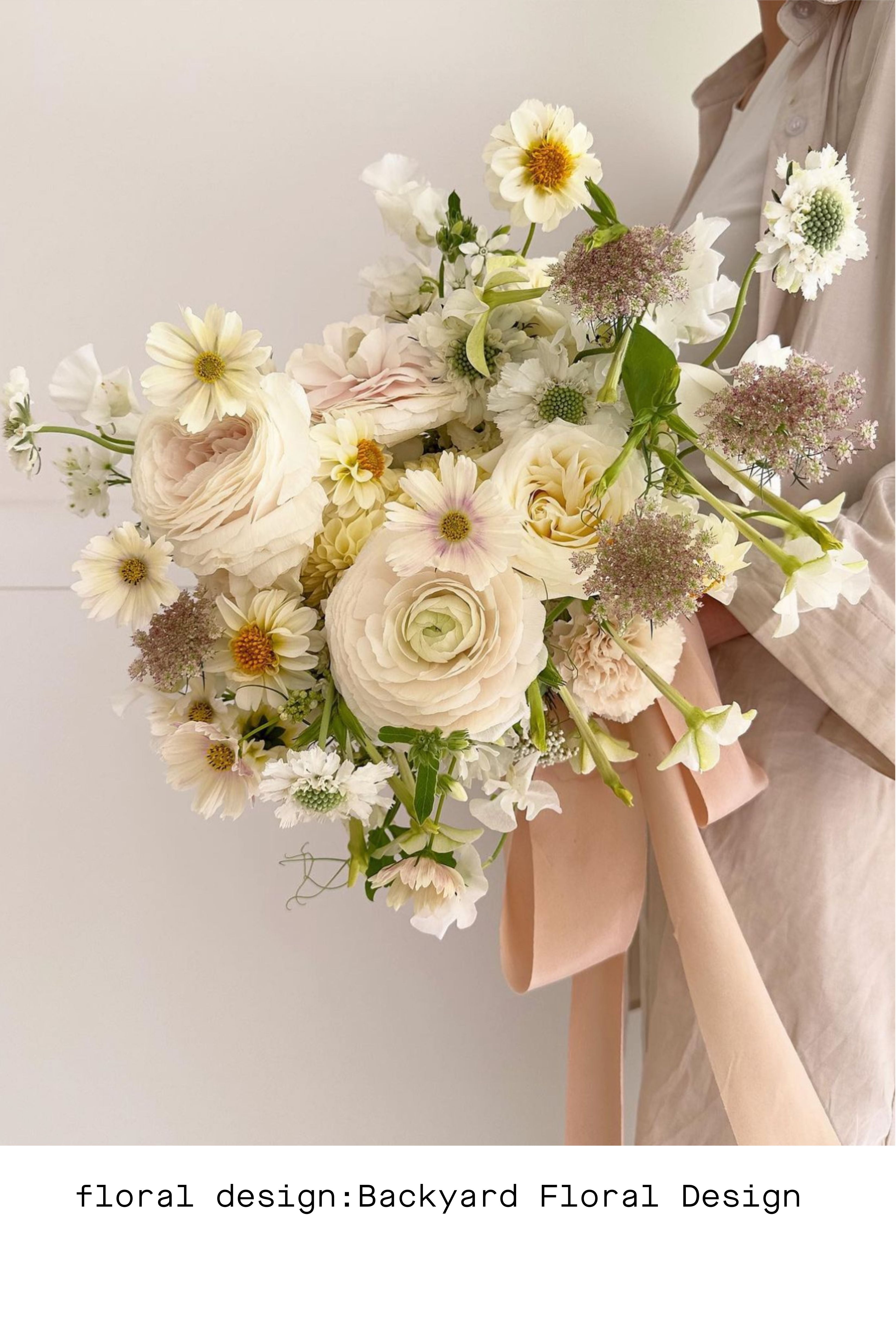 wedding bouquet with blush ribbon bow