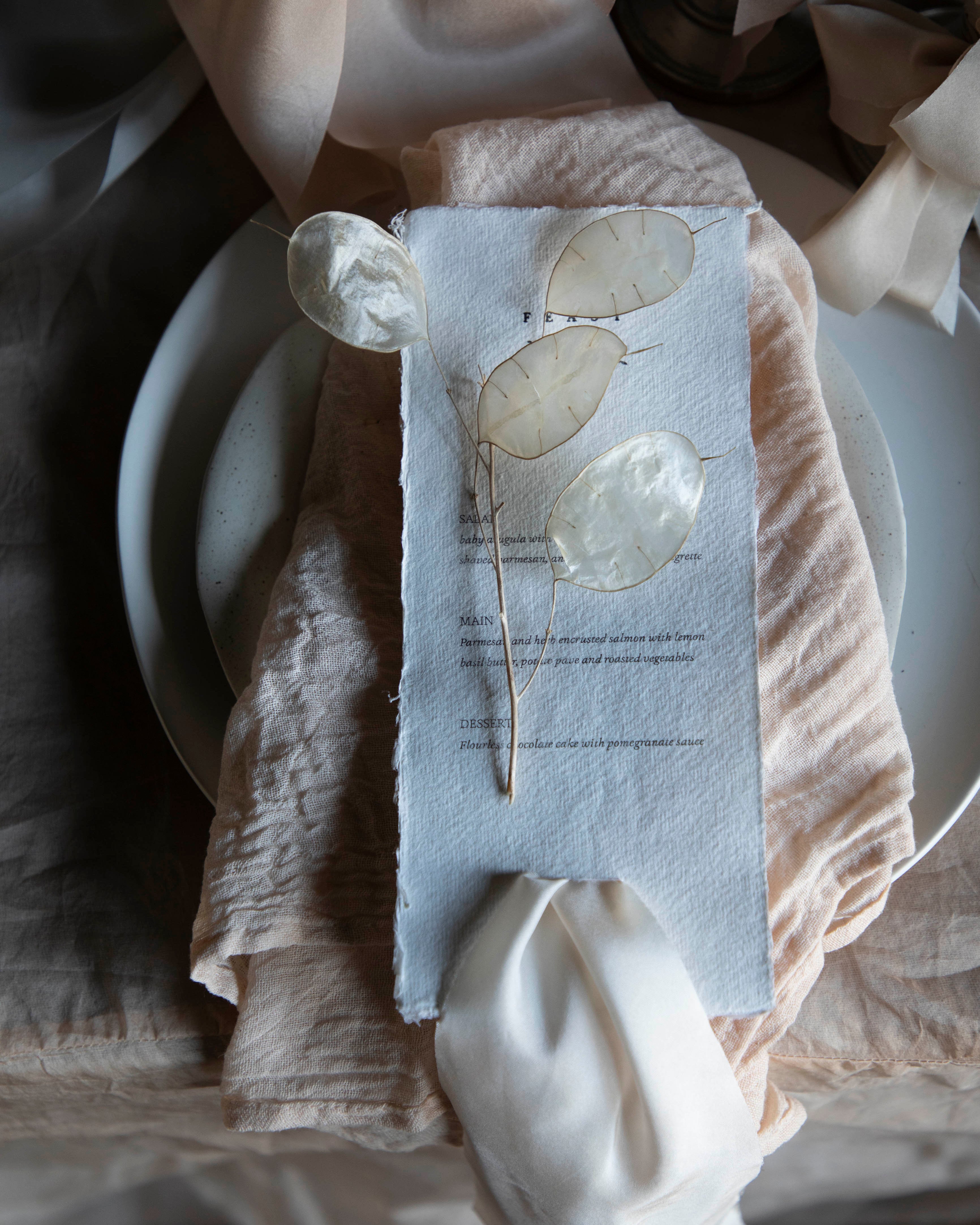 Decorative napkin with floral design on a table setting