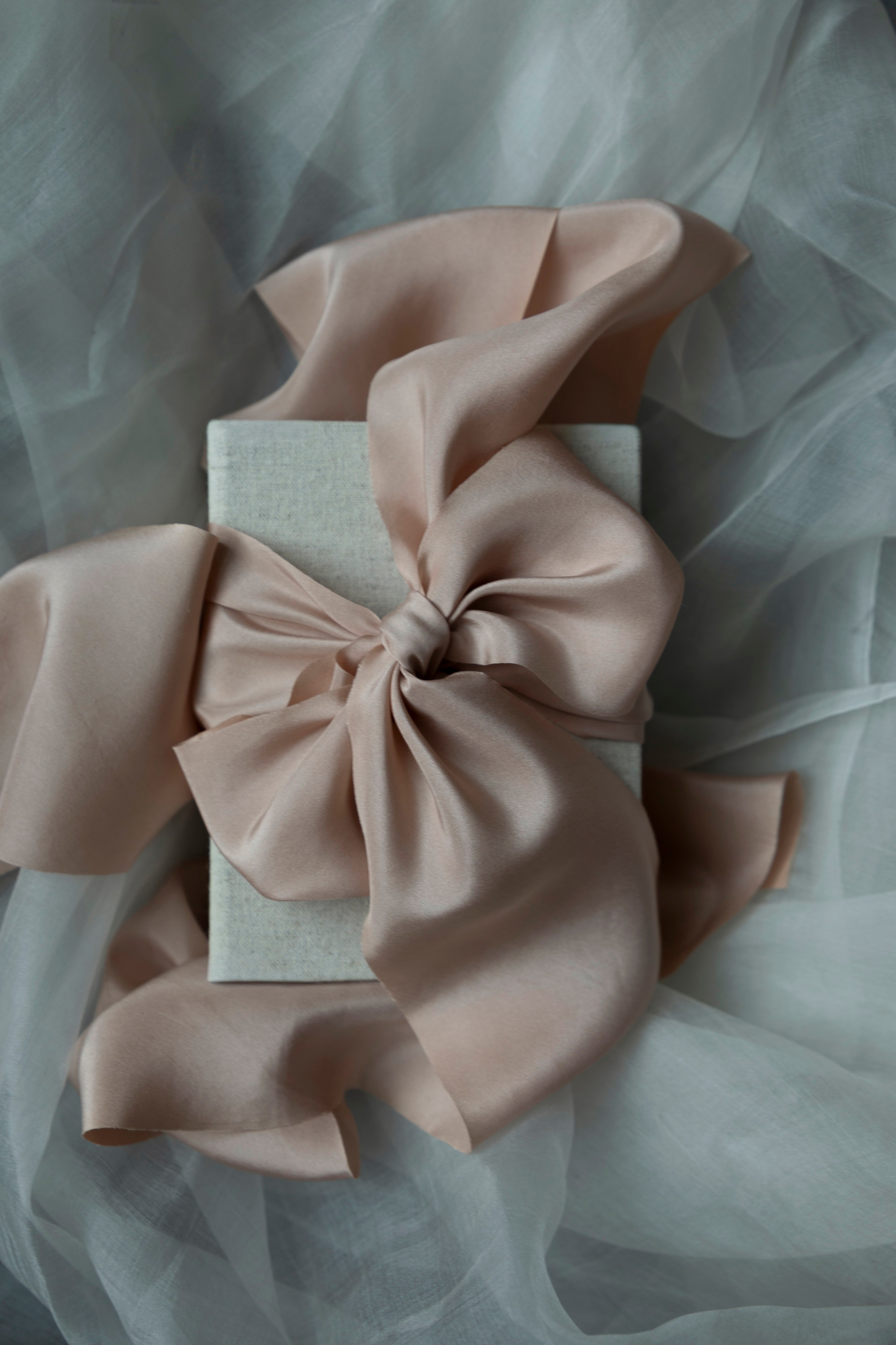 blush ribbon bow on linen gift box
