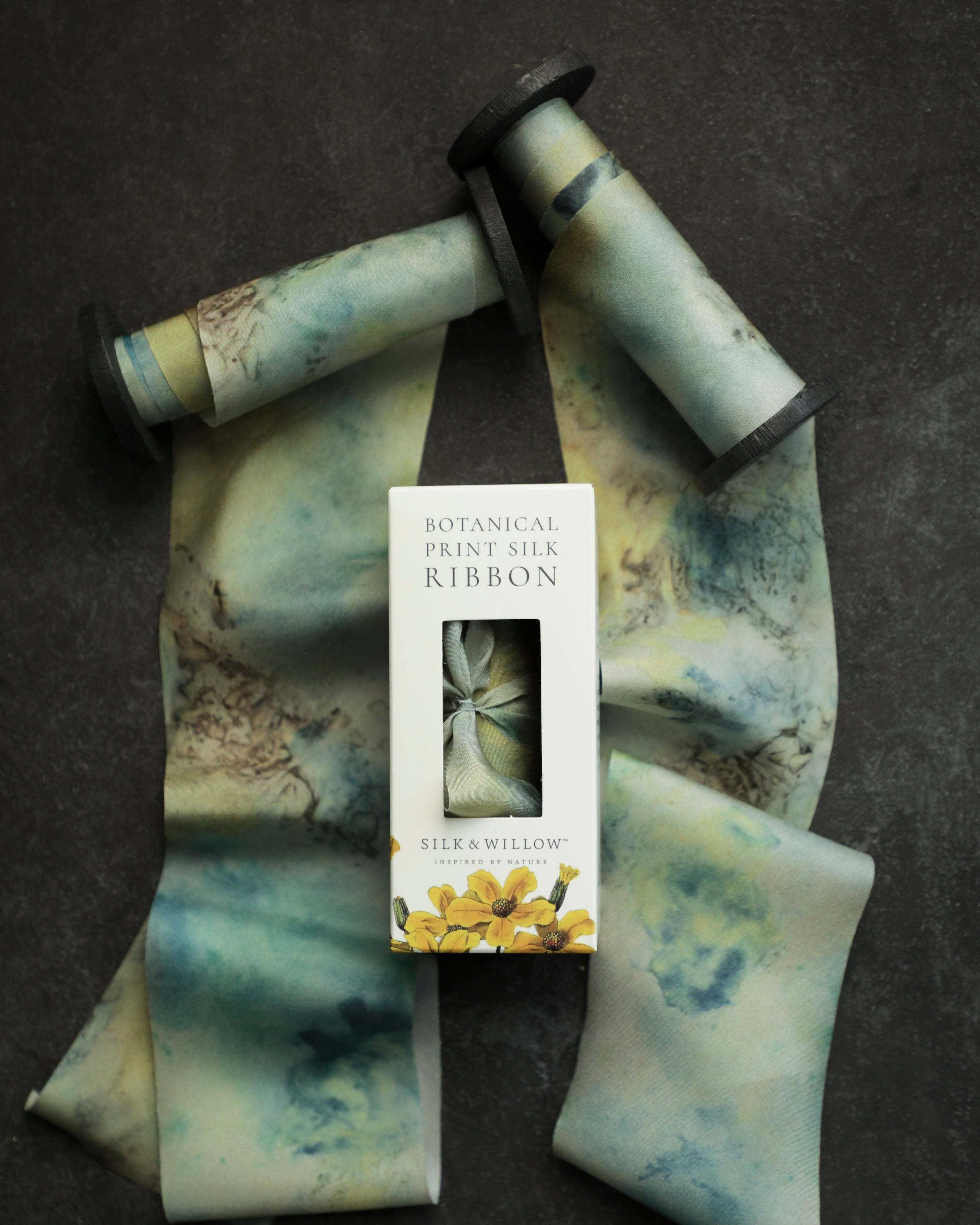 Eco-friendly silk ribbons with nature-inspired patterns, perfect for unique gift wrapping and tying market bouquets, crafted from sustainable materials