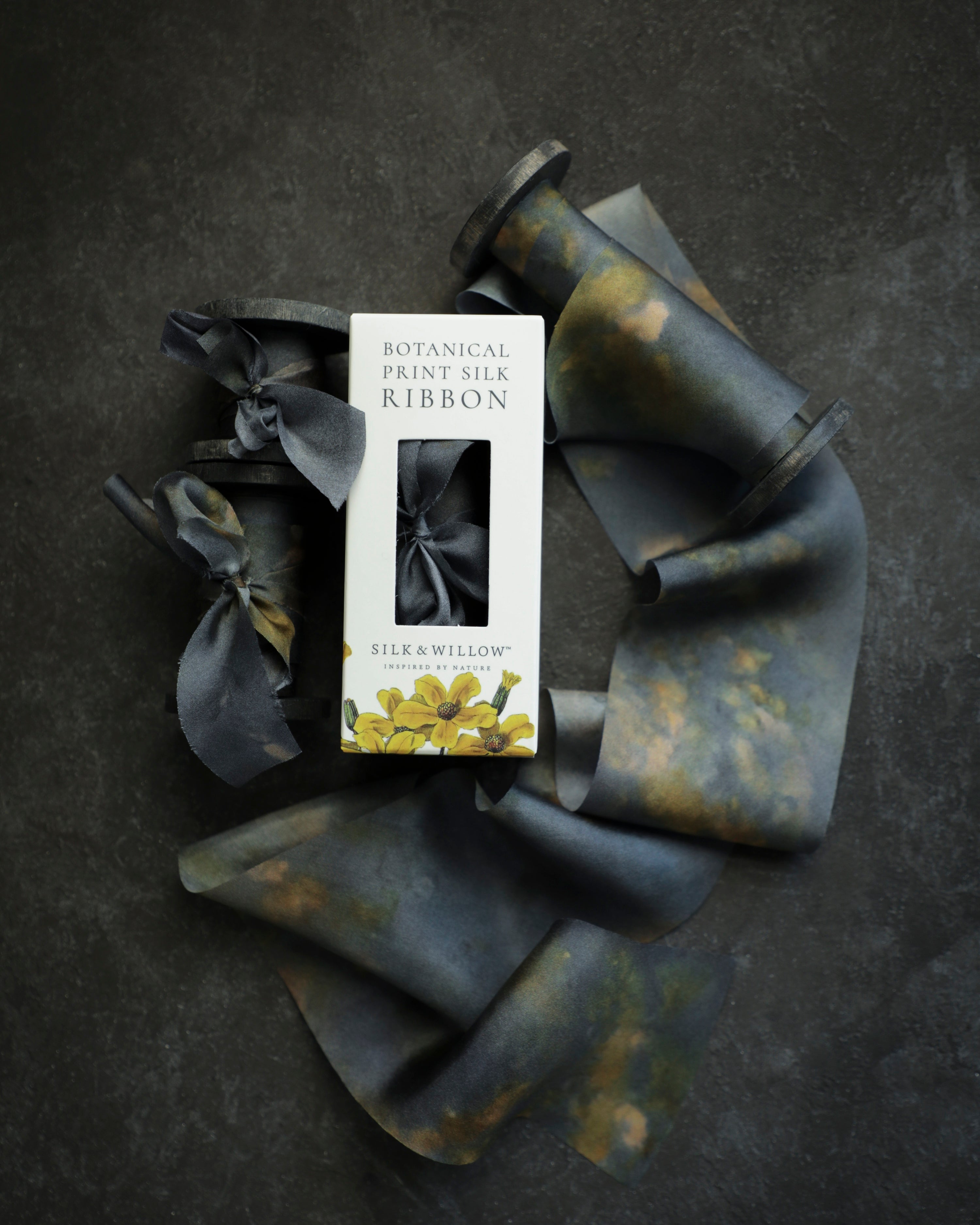 Eco-friendly silk ribbons with nature-inspired patterns, perfect for unique gift wrapping and tying market bouquets, crafted from sustainable materials