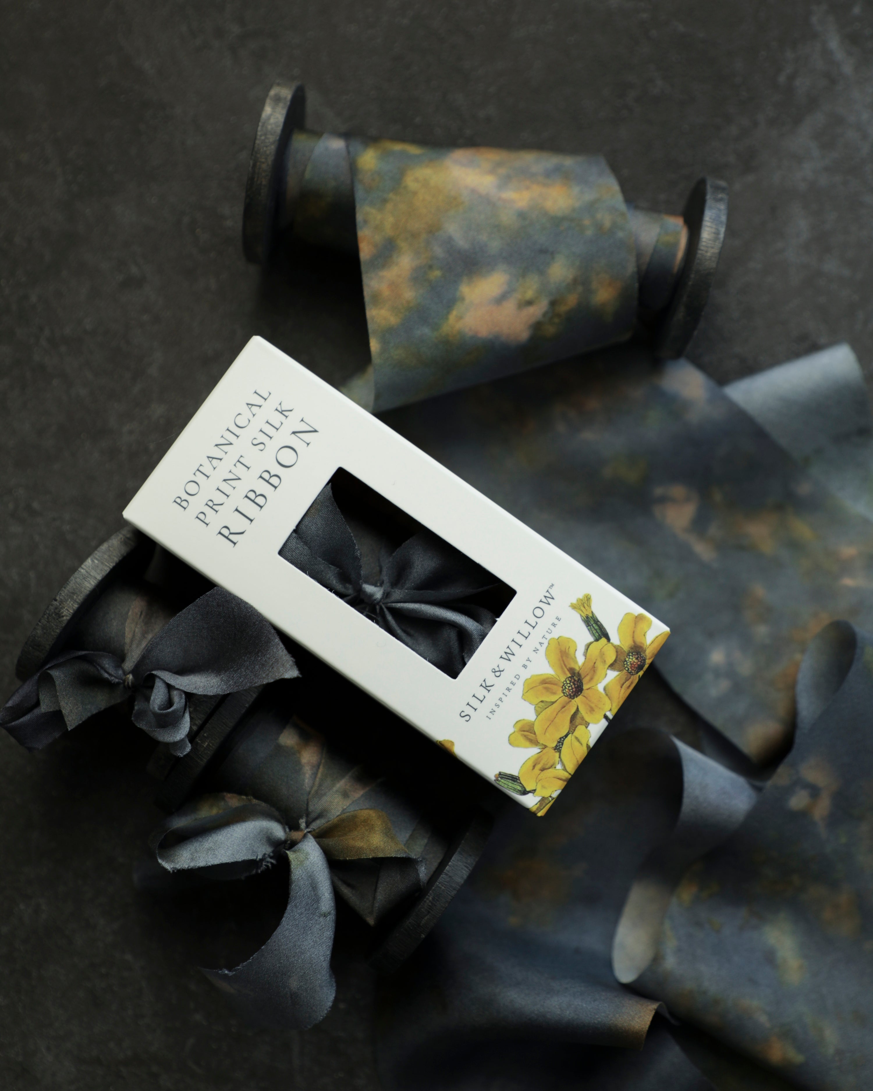 Eco-friendly silk ribbons with nature-inspired patterns, perfect for unique gift wrapping and tying market bouquets, crafted from sustainable materials