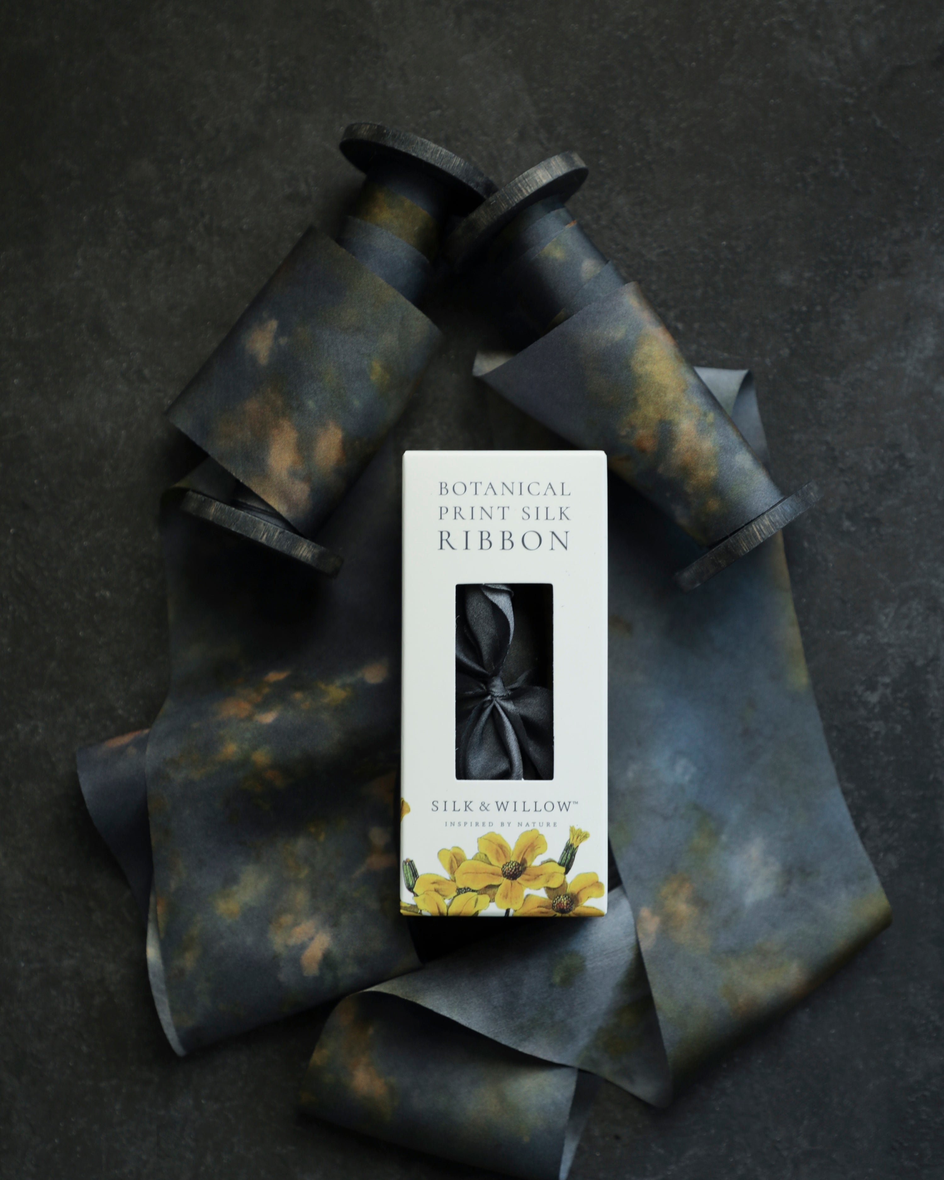 Eco-friendly silk ribbons with nature-inspired patterns, perfect for unique gift wrapping and tying market bouquets, crafted from sustainable materials