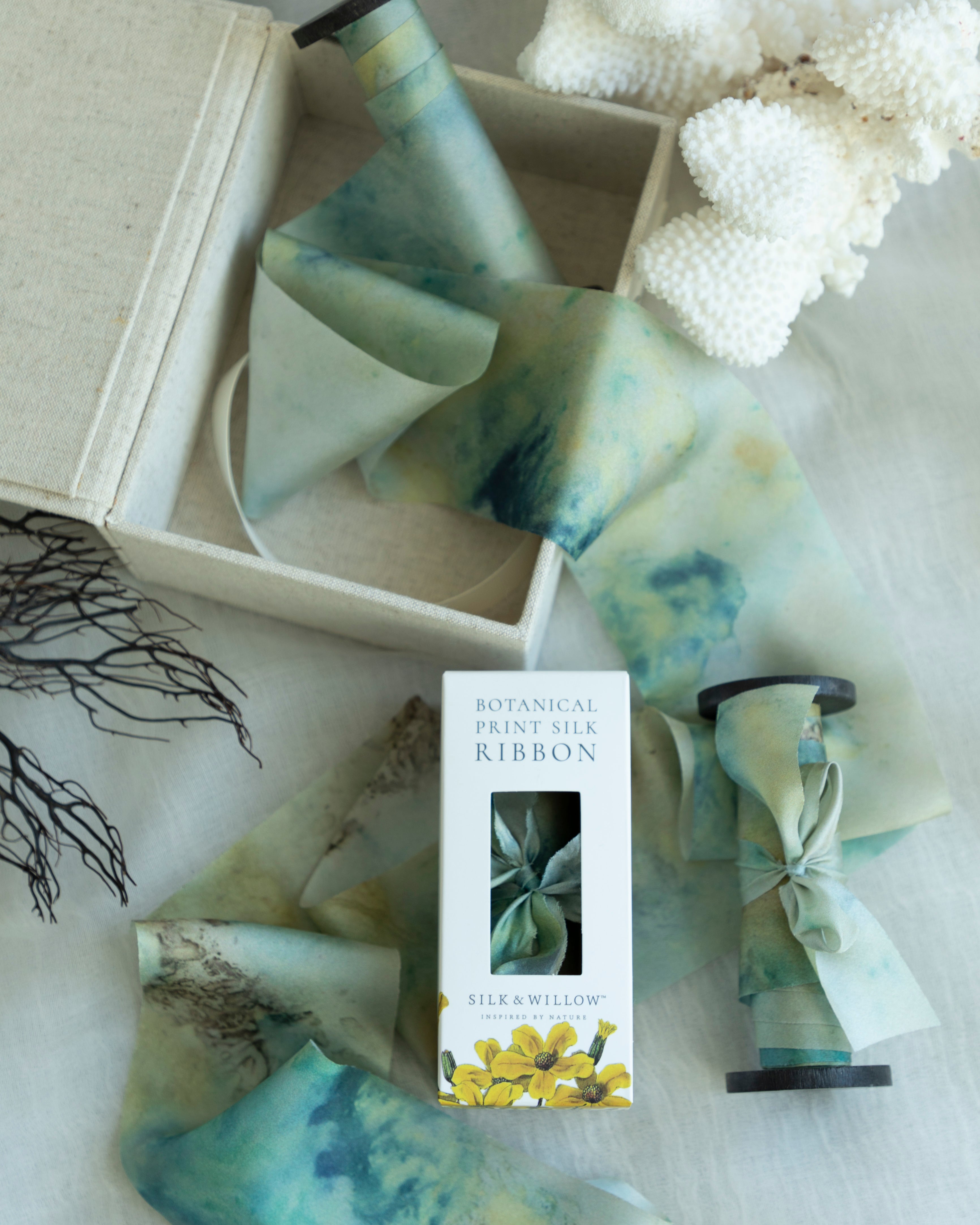 Eco-friendly silk ribbons with nature-inspired patterns, perfect for unique gift wrapping and tying market bouquets, crafted from sustainable materials