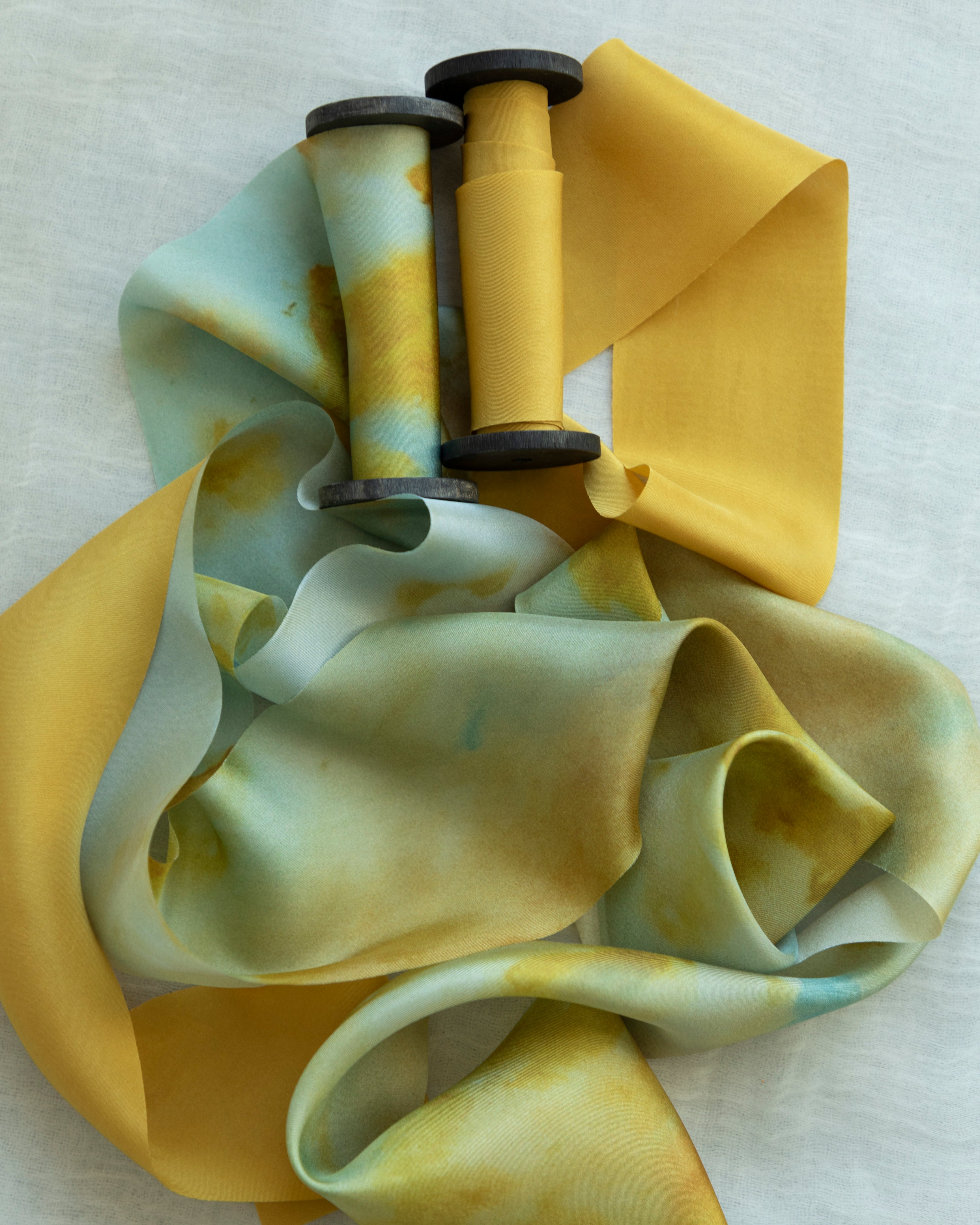 Eco-friendly silk ribbons with nature-inspired patterns, perfect for unique gift wrapping and tying market bouquets, crafted from sustainable materials