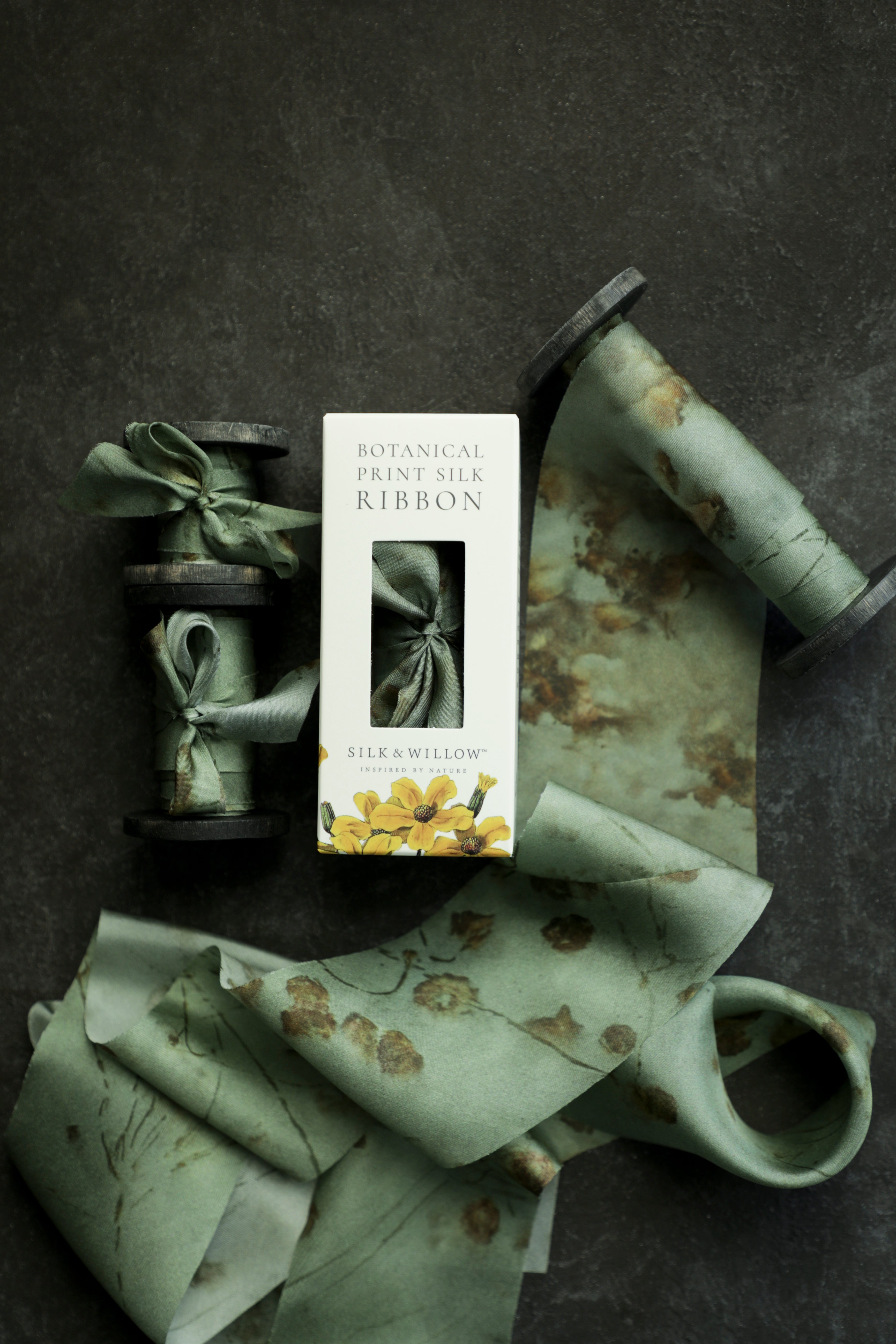 Eco-friendly silk ribbons with nature-inspired patterns, perfect for unique gift wrapping and tying market bouquets, crafted from sustainable materials