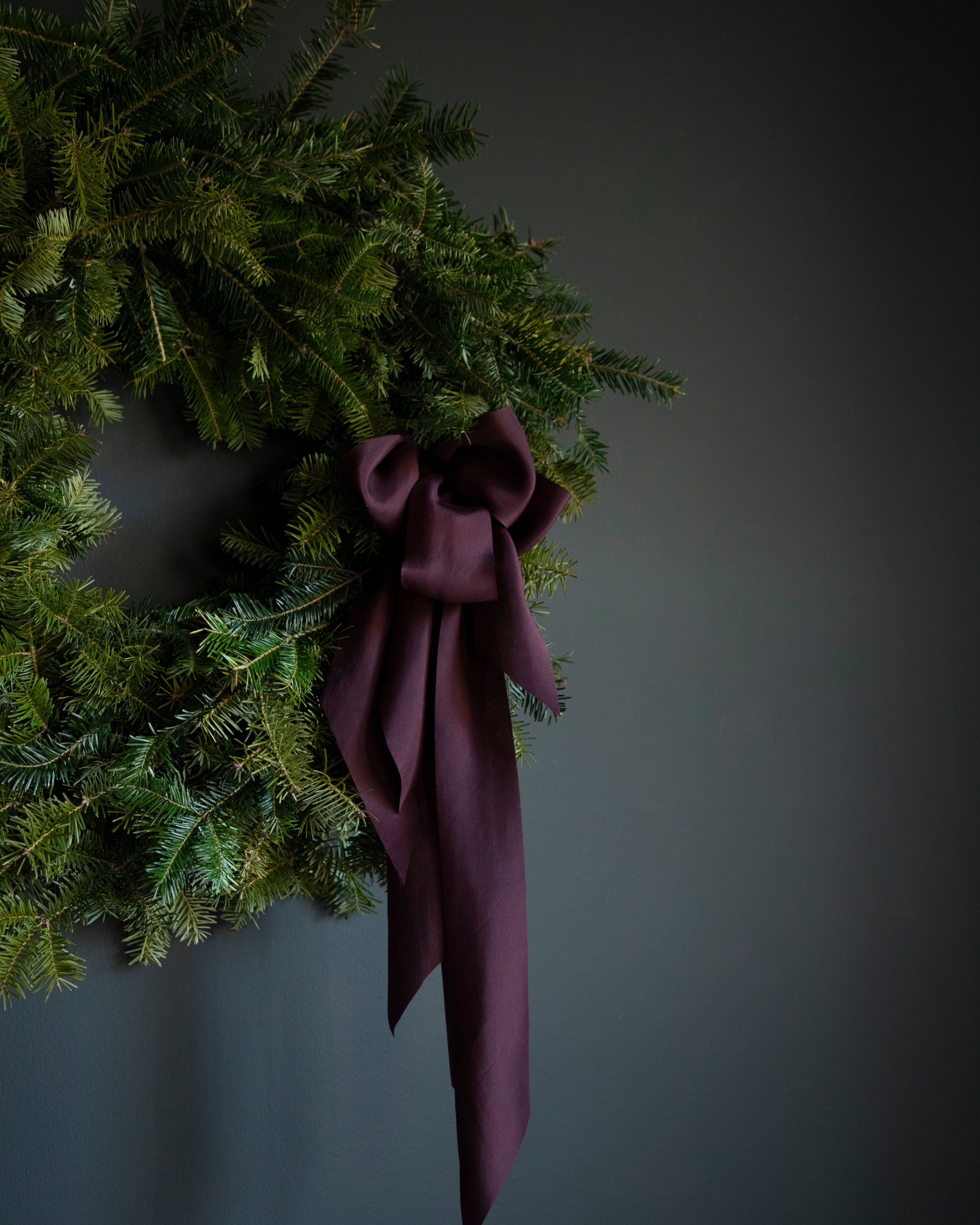 eggplant colored silk ribbon. holiday wreath with ribbon bows