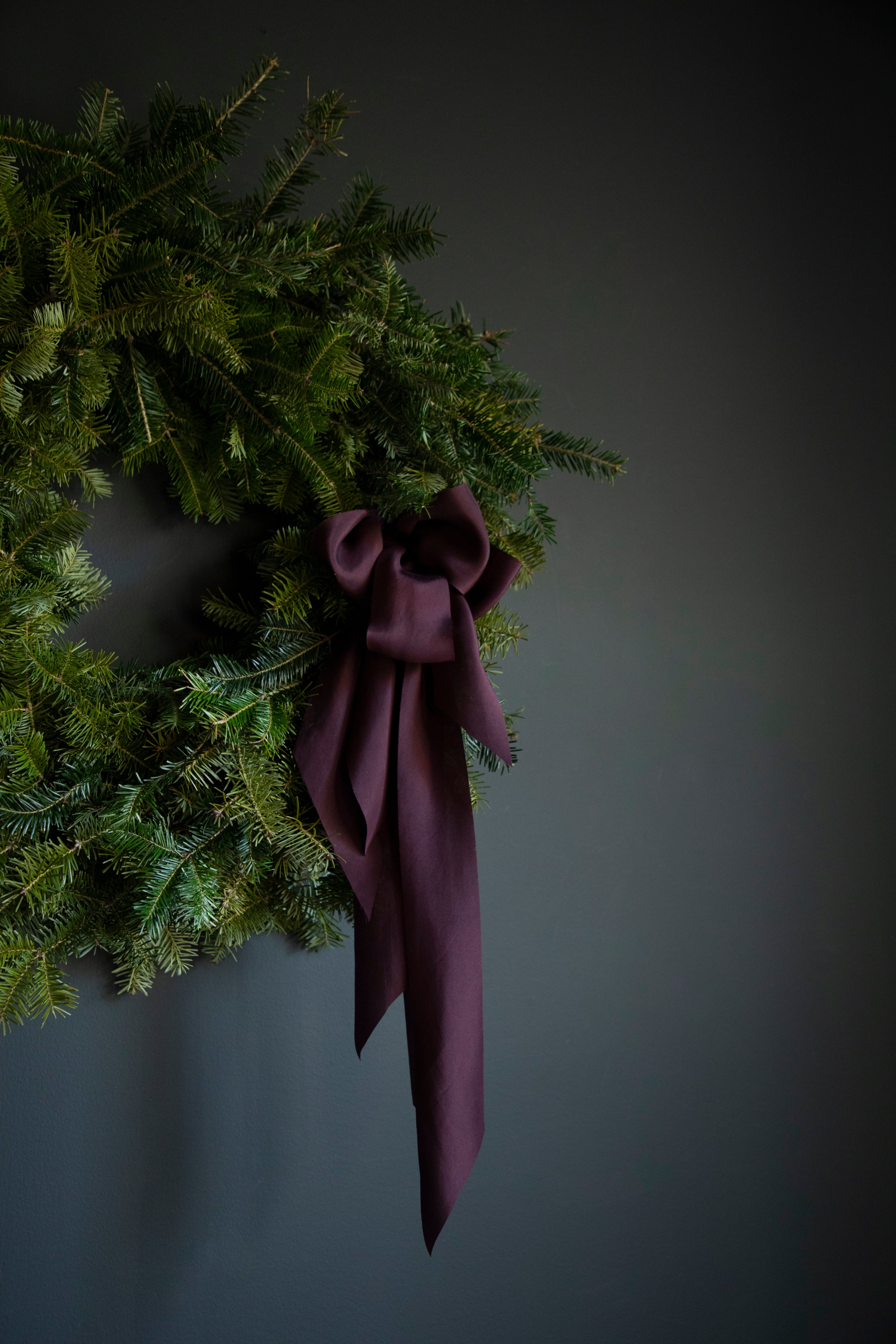 eggplant colored silk ribbon. holiday wreath with ribbon bows