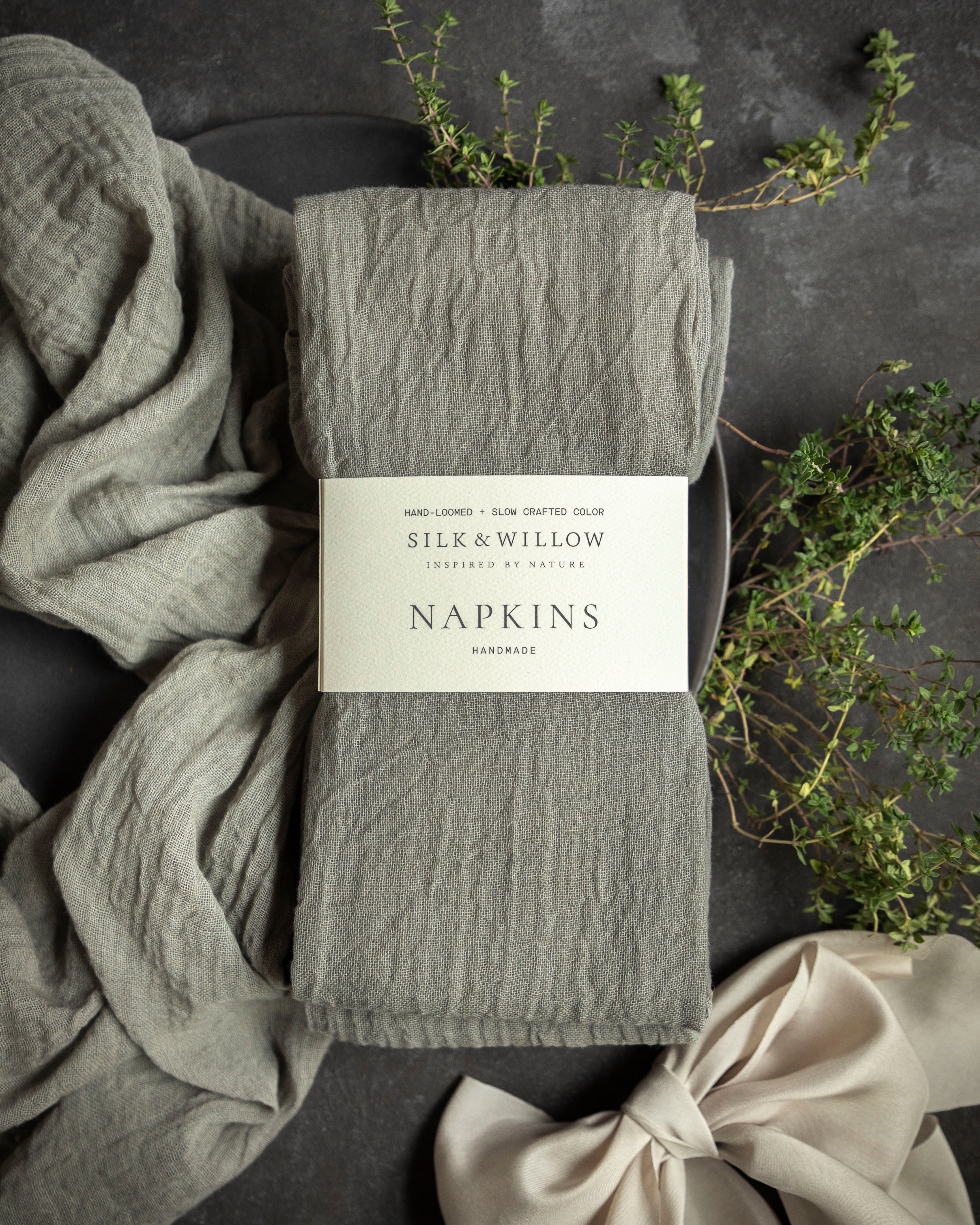 Eco-conscious wedding decor featuring gray cotton napkins. Hand-loomed and plant dyed cotton napkins beautifully packaged perfect hotess gift