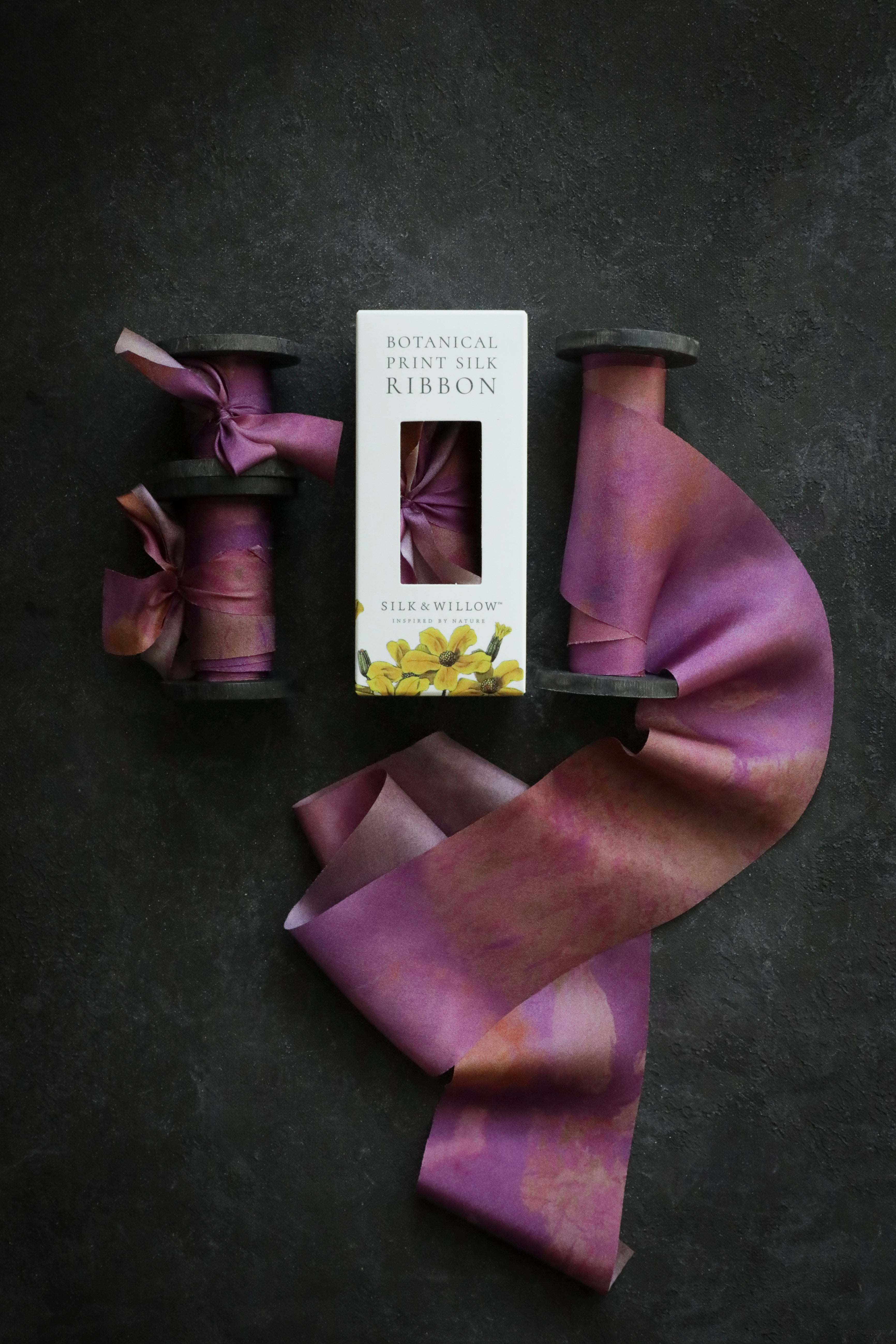 Eco-friendly silk ribbons with nature-inspired patterns, perfect for unique gift wrapping and tying market bouquets, crafted from sustainable materials