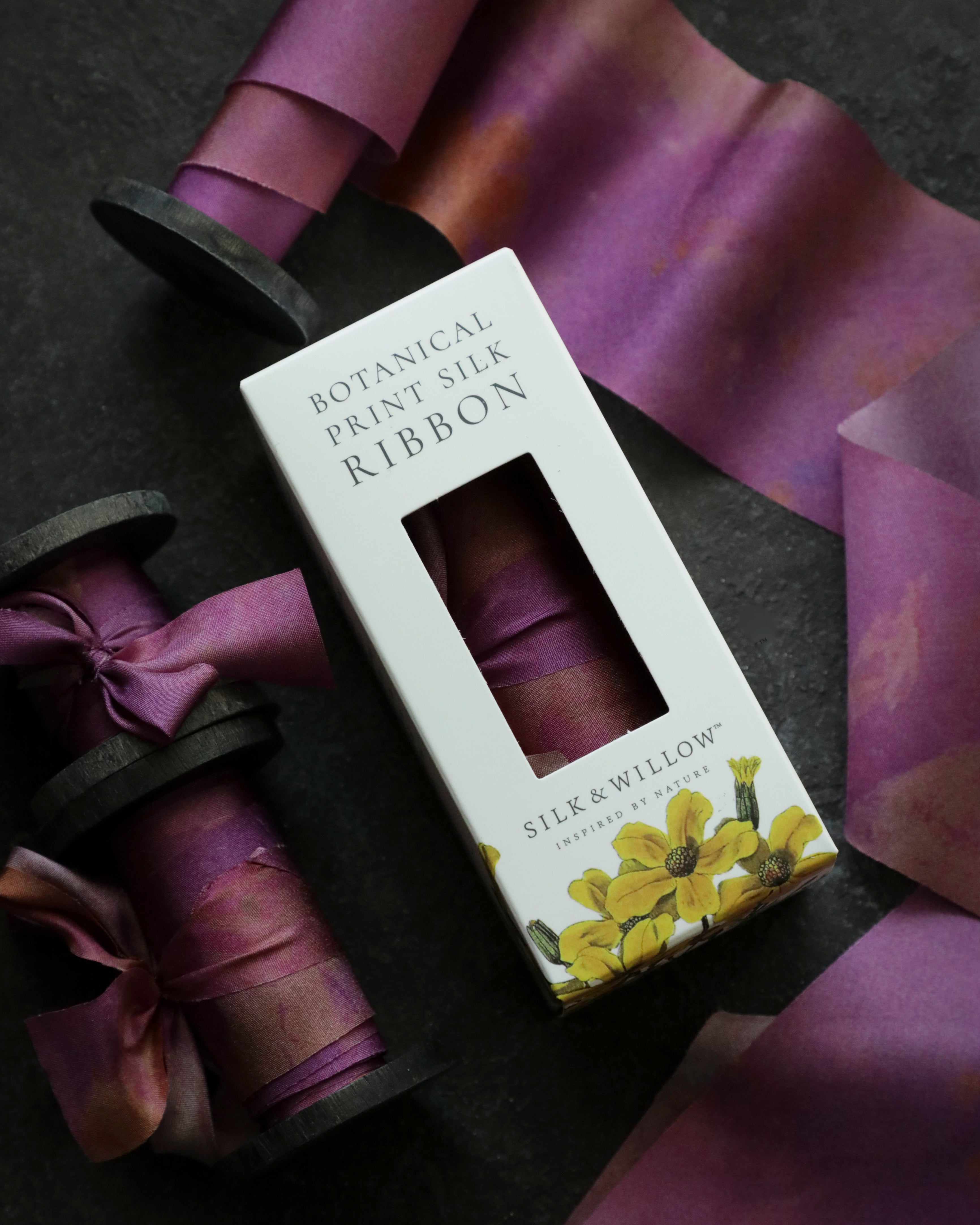 Eco-friendly silk ribbons with nature-inspired patterns, perfect for unique gift wrapping and tying market bouquets, crafted from sustainable materials