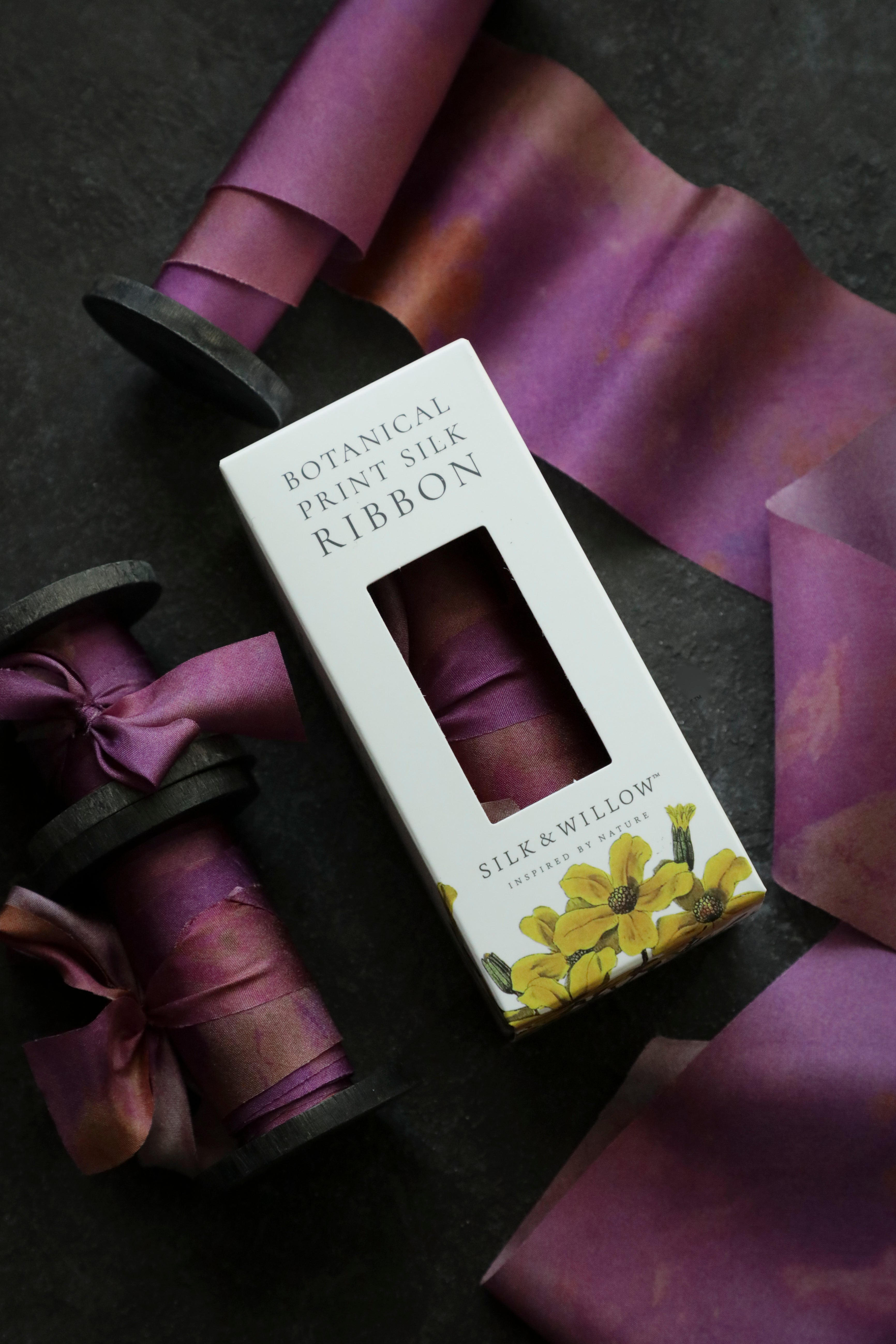 Eco-friendly silk ribbons with nature-inspired patterns, perfect for unique gift wrapping and tying market bouquets, crafted from sustainable materials
