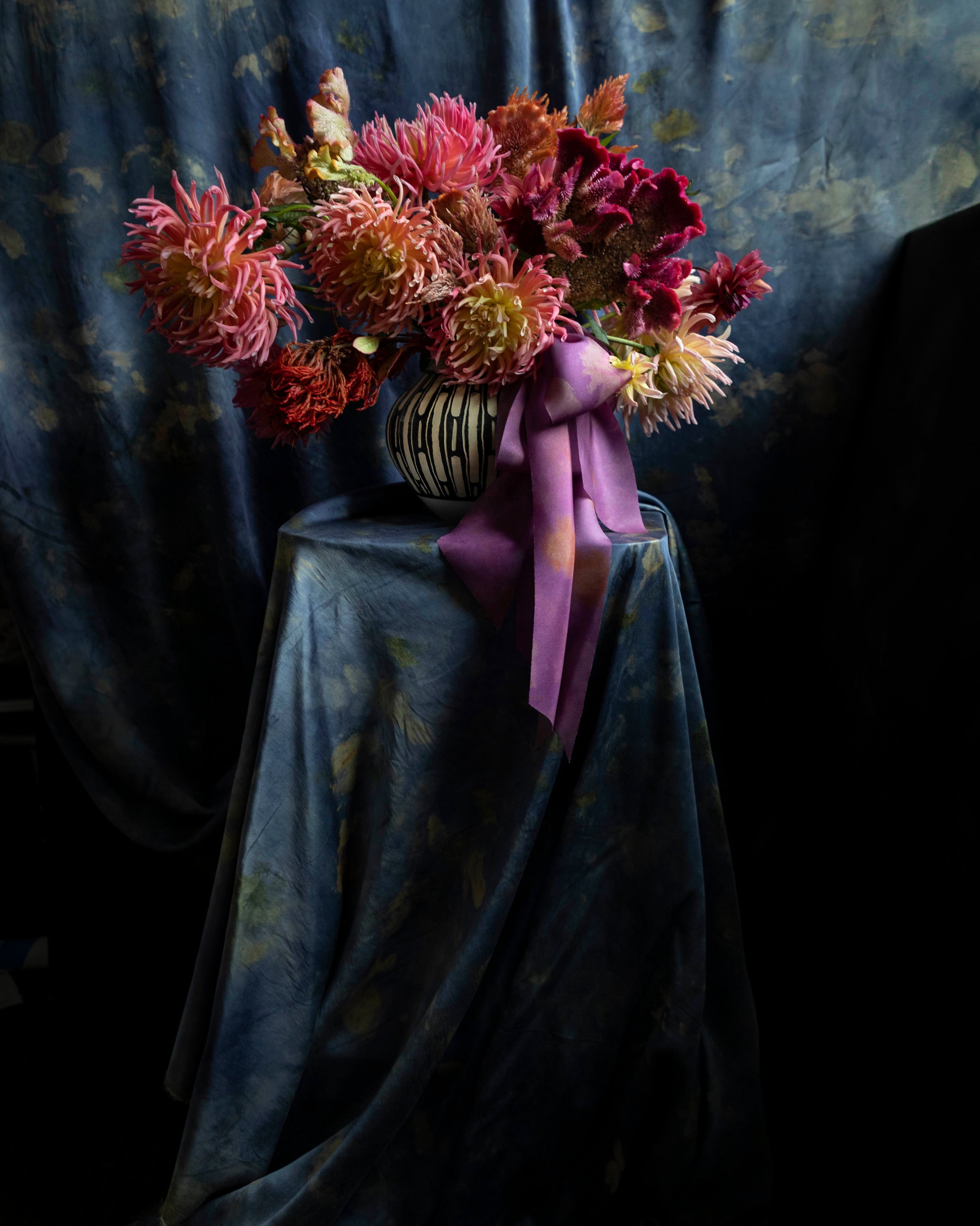 floral design display with dahlia flower.