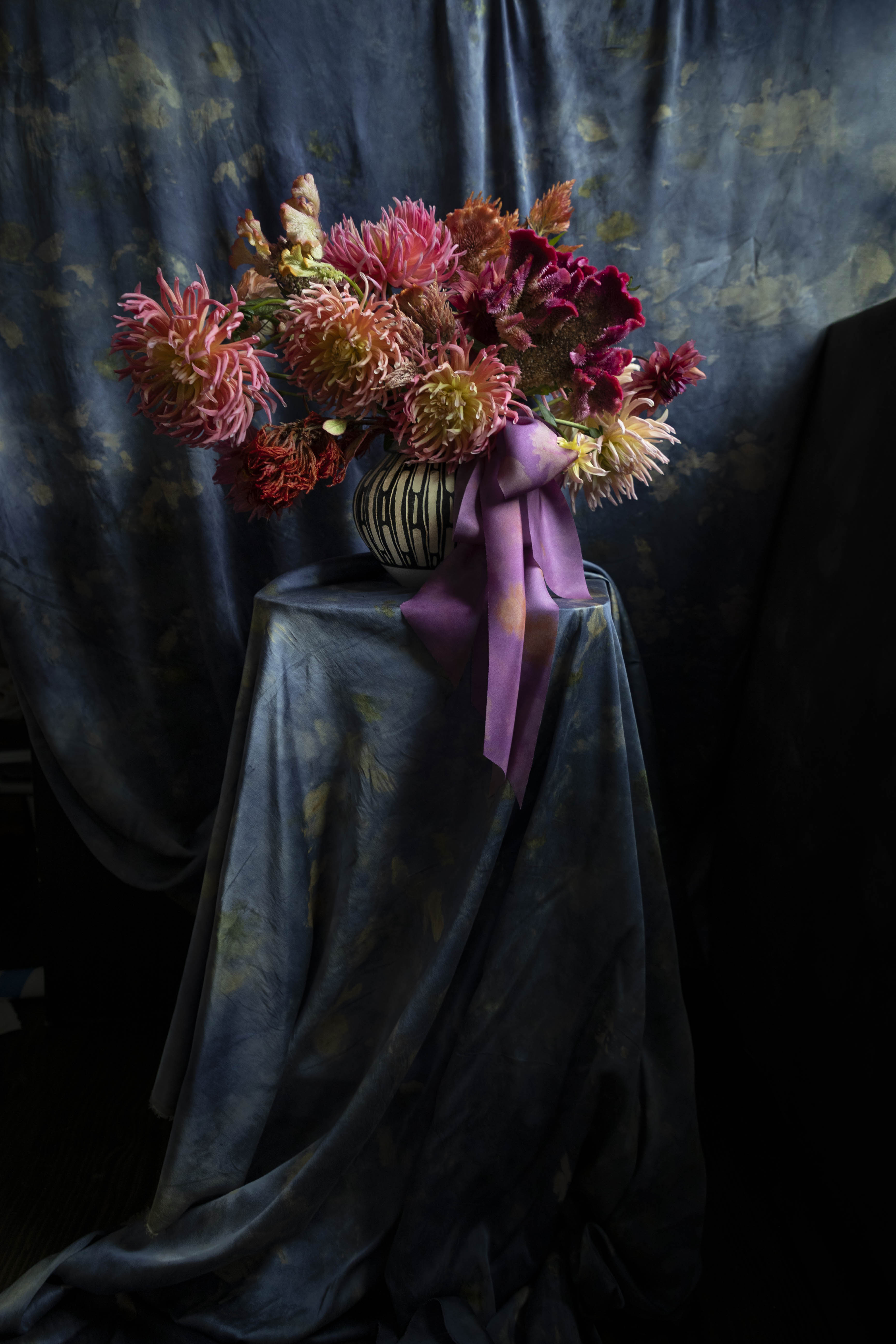 floral design display with dahlia flower.