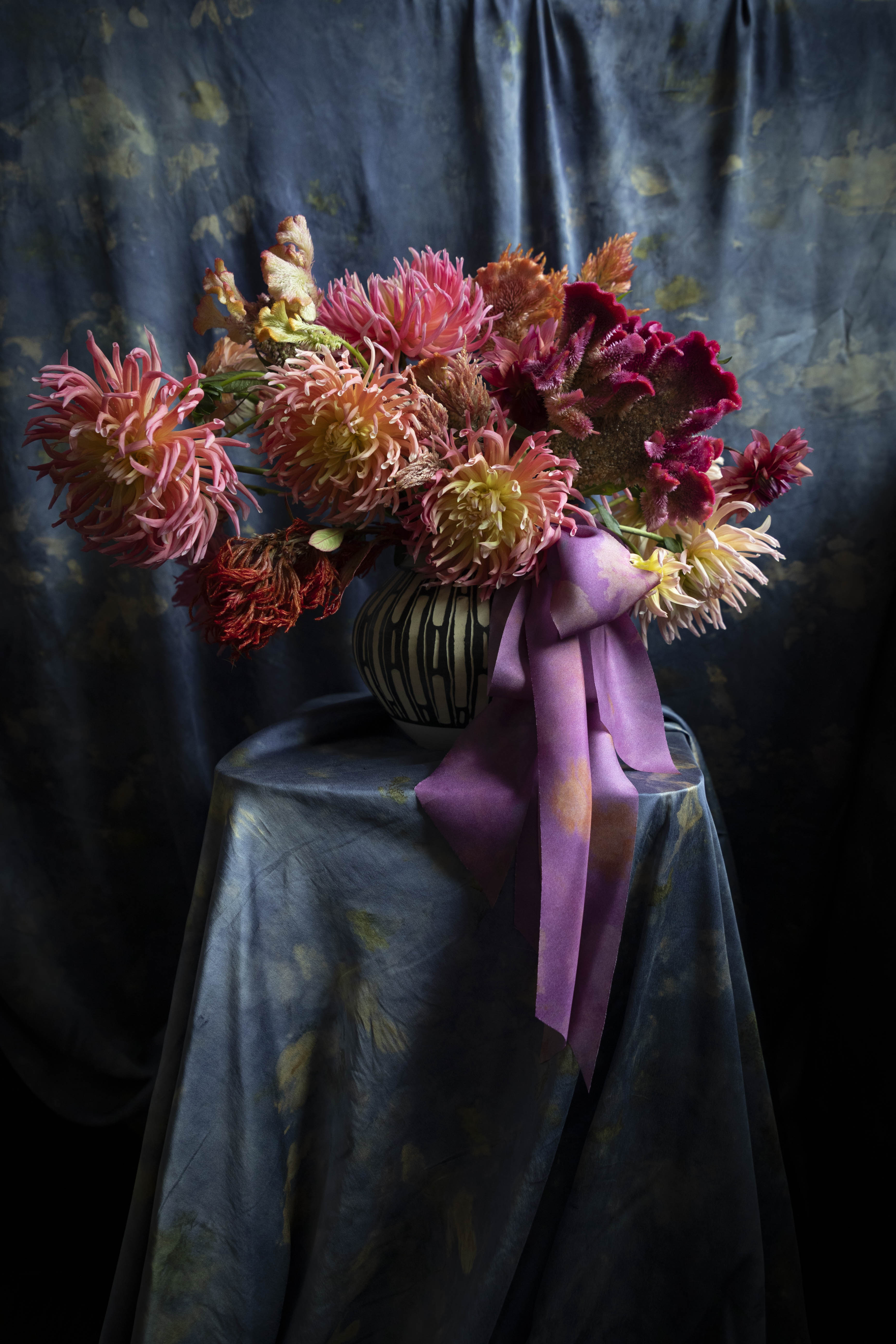 dahlia floral centerpiece tied with silk ribbon bow. Eco-friendly silk ribbons with nature-inspired patterns, perfect for unique gift wrapping and tying market bouquets, crafted from sustainable materials