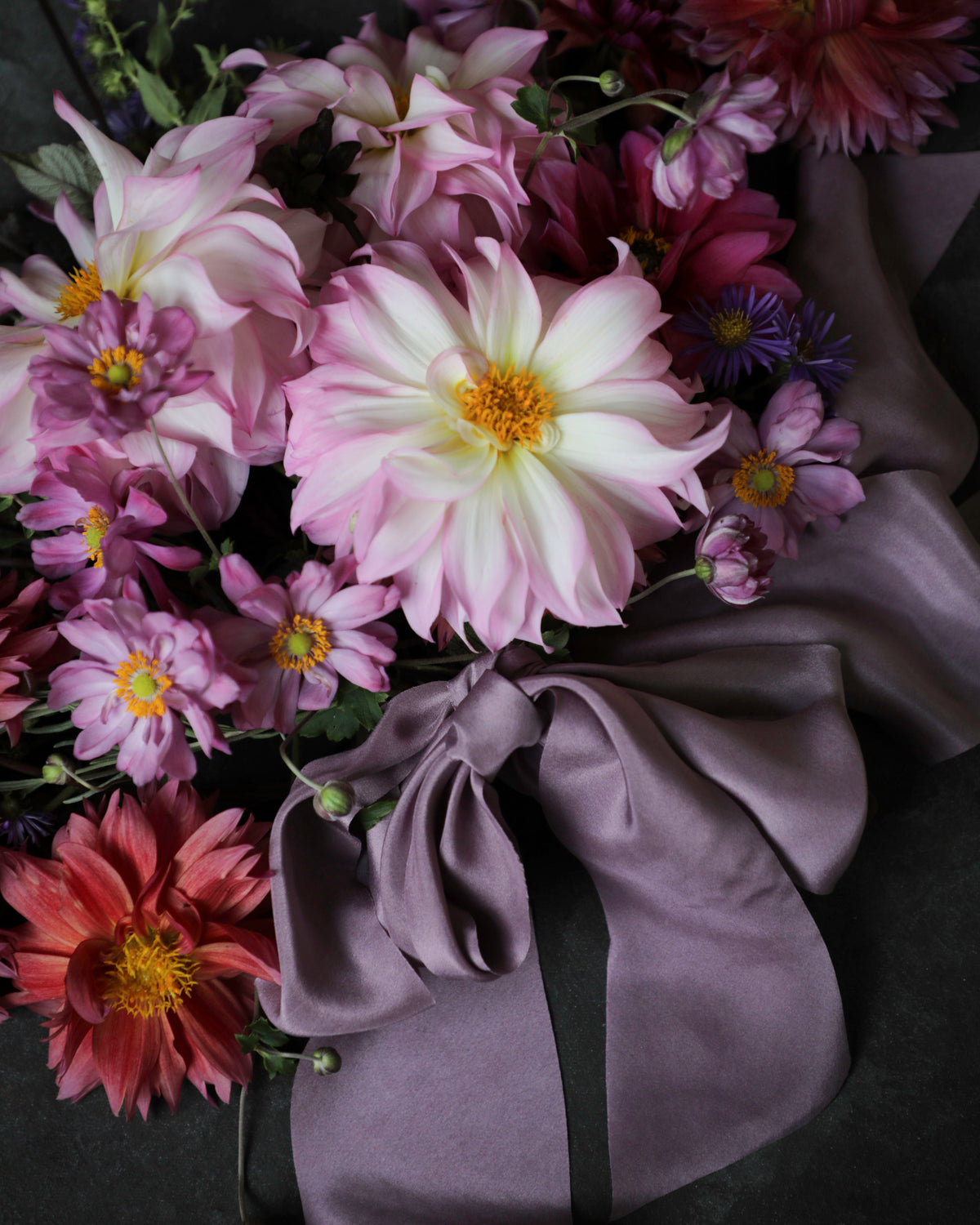 Pink and purple dahlia flower bouquet tied with a purple silk & Willow silk ribbon bow